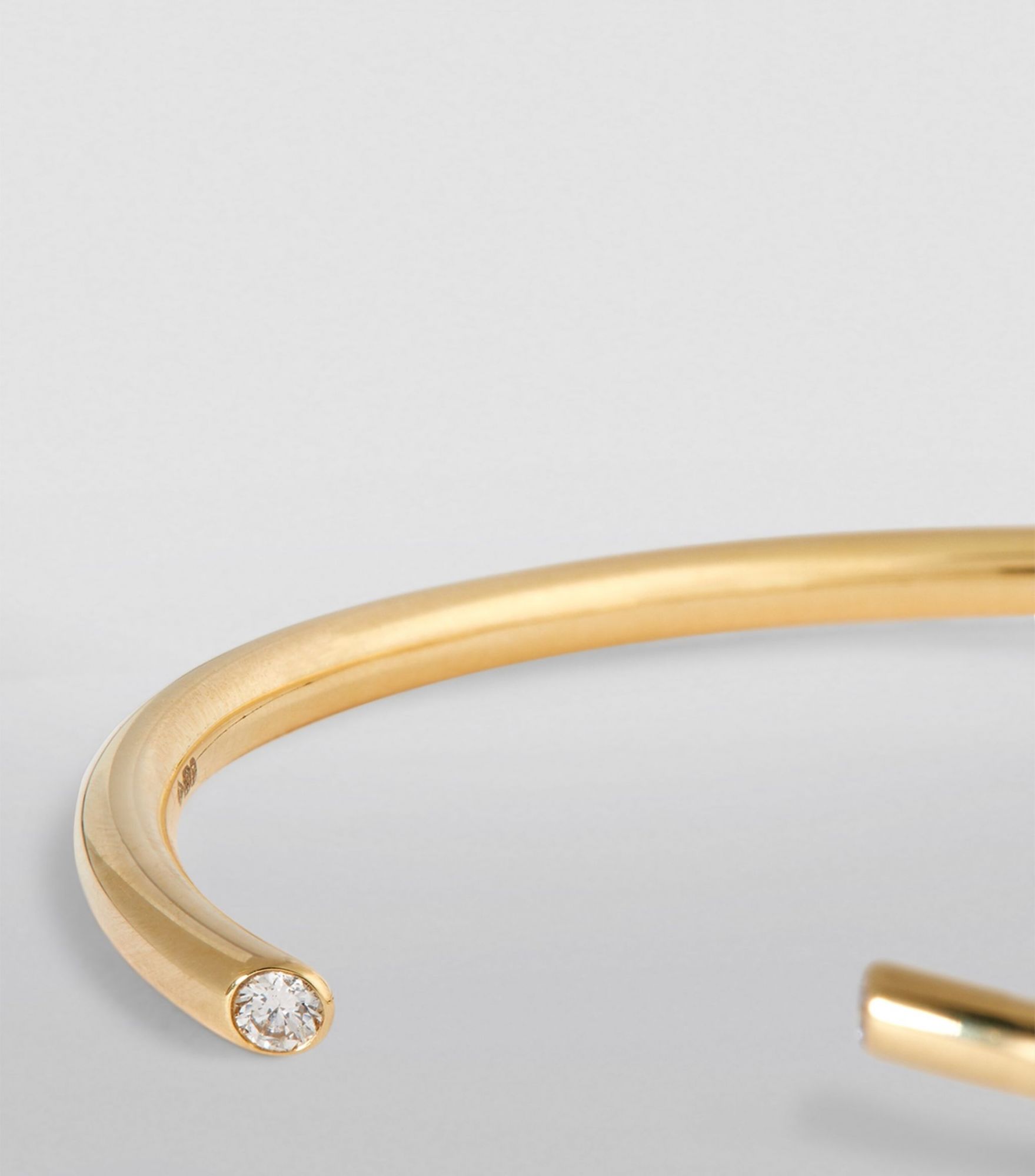 Vanrycke Yellow Gold and Diamond Massaï Bangle. | Photo: harrods.com