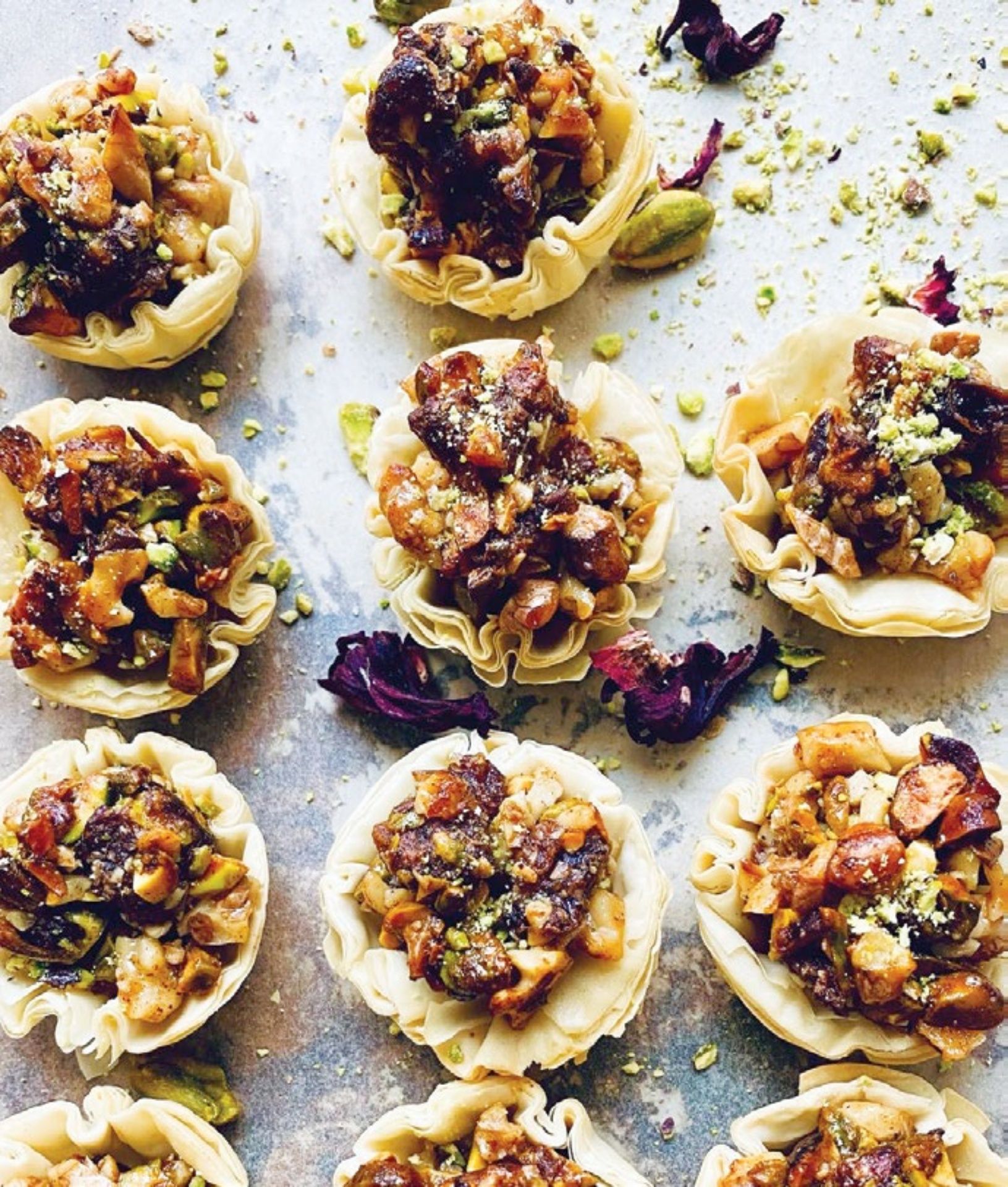 Mini baklava bites with pistachio, walnut and dates scented with cardamom and rose