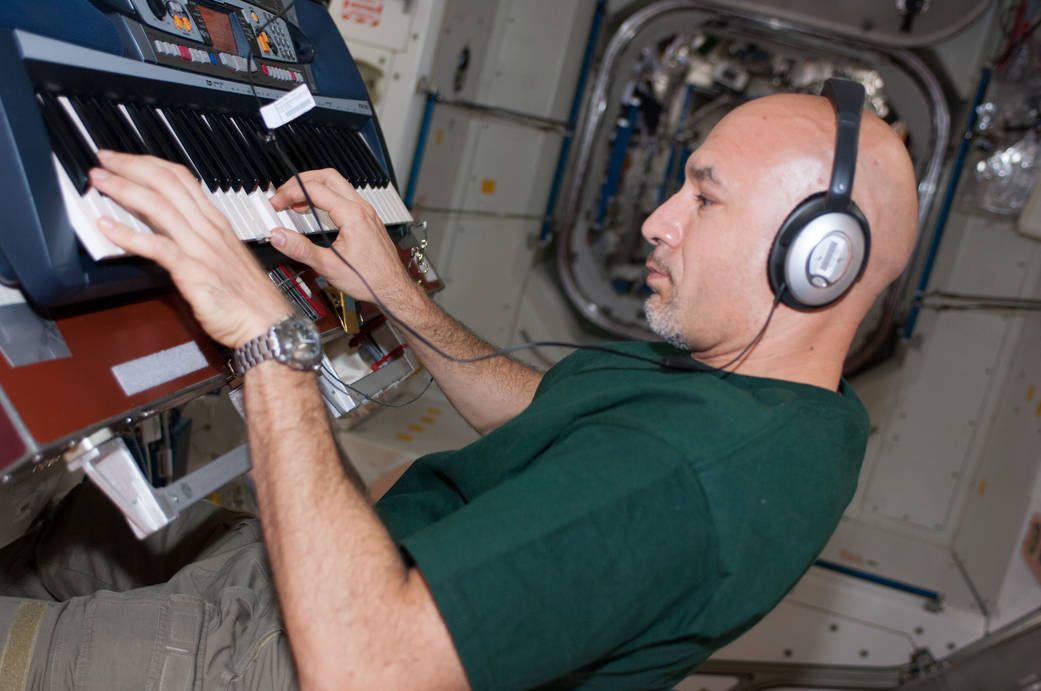 European Space Agency astronaut Luca Parmitano, Expedition 36 flight engineer, plays a keyboard instrument in the Unity node during some of his off-duty time aboard the Earth-orbiting International Space Station. Parmitano is scheduled to stay aboard the orbital outpost until November. | Photo: NASA