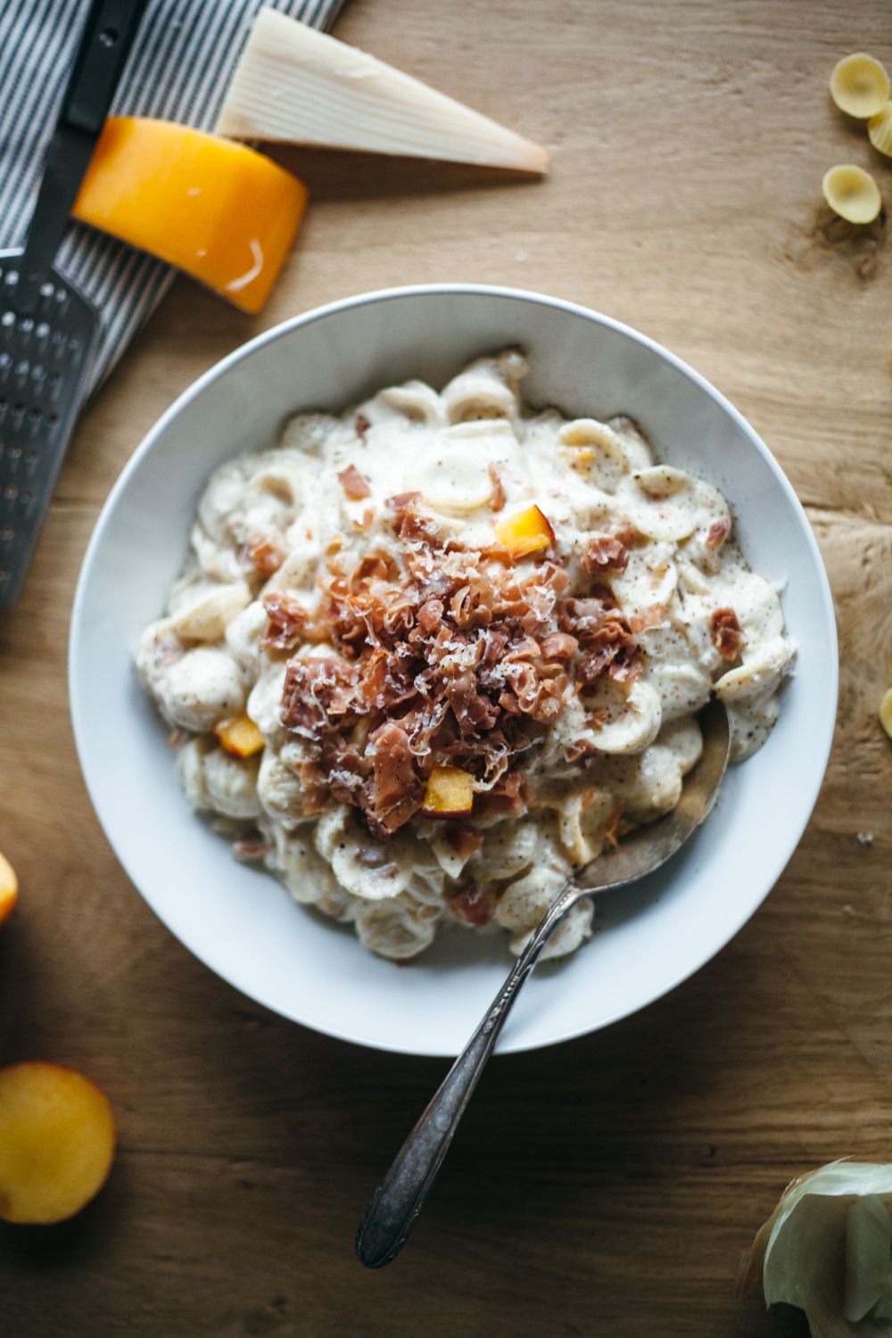 Gouda mac and cheese with peaches and prosciutto