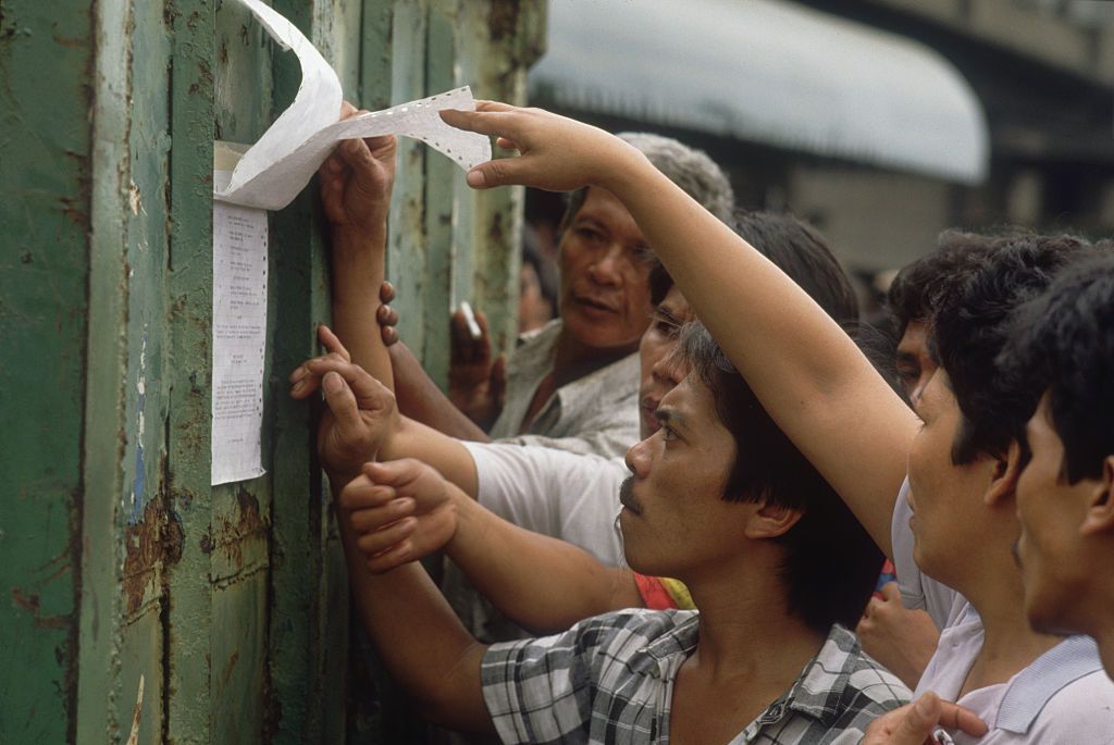 Relatives of the passengers who were on the wrecked Dona Paz show up at the headquarters of the shipping company. | Photo by Patrick Durand/Sygma via Getty Images