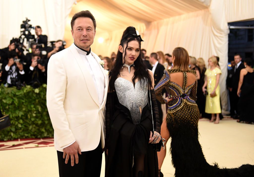 NEW YORK, NY - MAY 07: Elon Musk and Grimes attend the Heavenly Bodies: Fashion & The Catholic Imagination Costume Institute Gala at The Metropolitan Museum of Art on May 7, 2018 in New York City. (Photo by Jason Kempin/Getty Images)