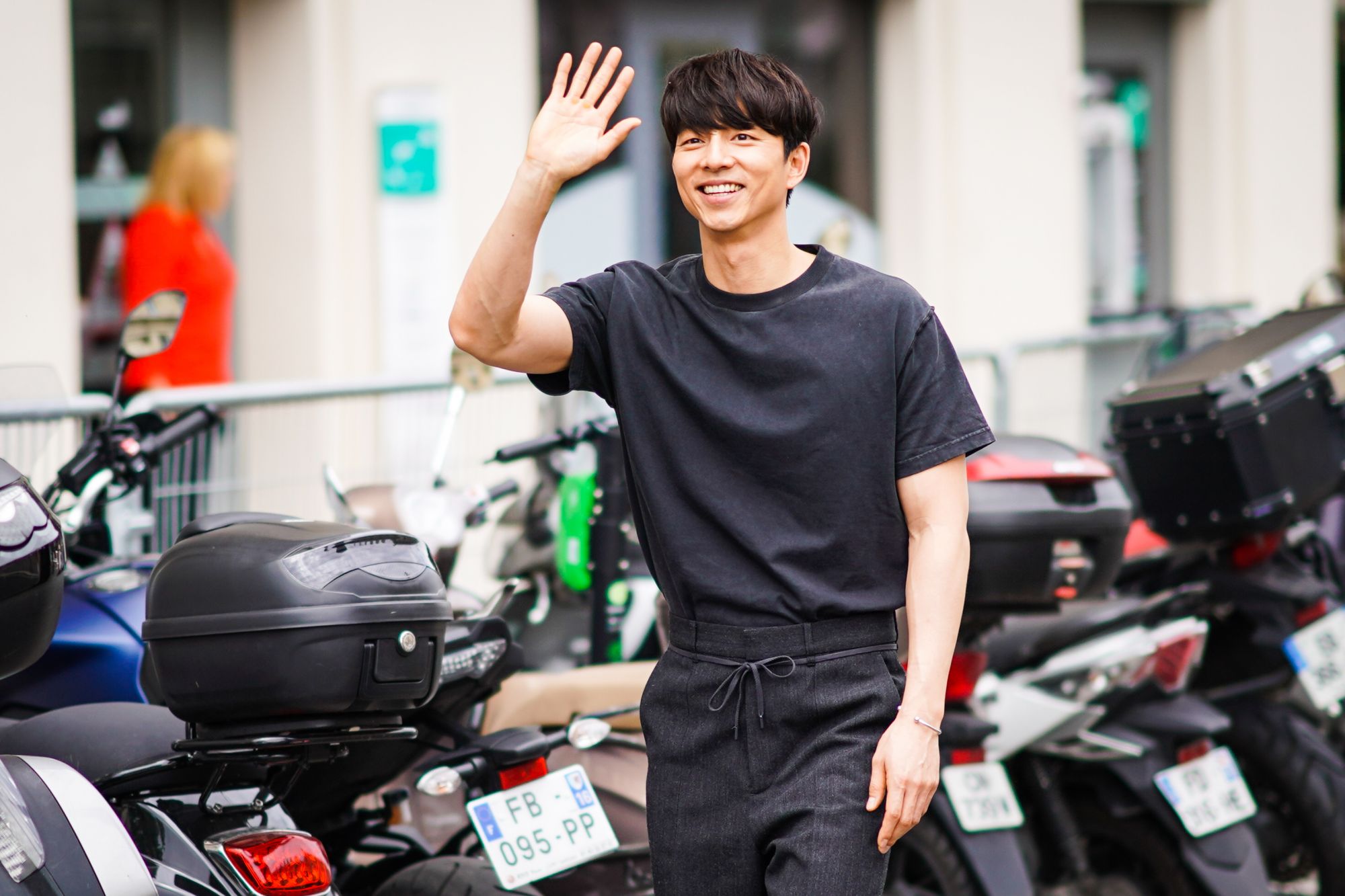 PARIS, FRANCE - JUNE 20: Gong Yoo wears a black t-shirt, black pants with a bow belt, outside Vuitton, during Paris Fashion Week - Menswear Spring/Summer 2020, on June 20, 2019 in Paris, France. (Photo by Edward Berthelot/Getty Images)