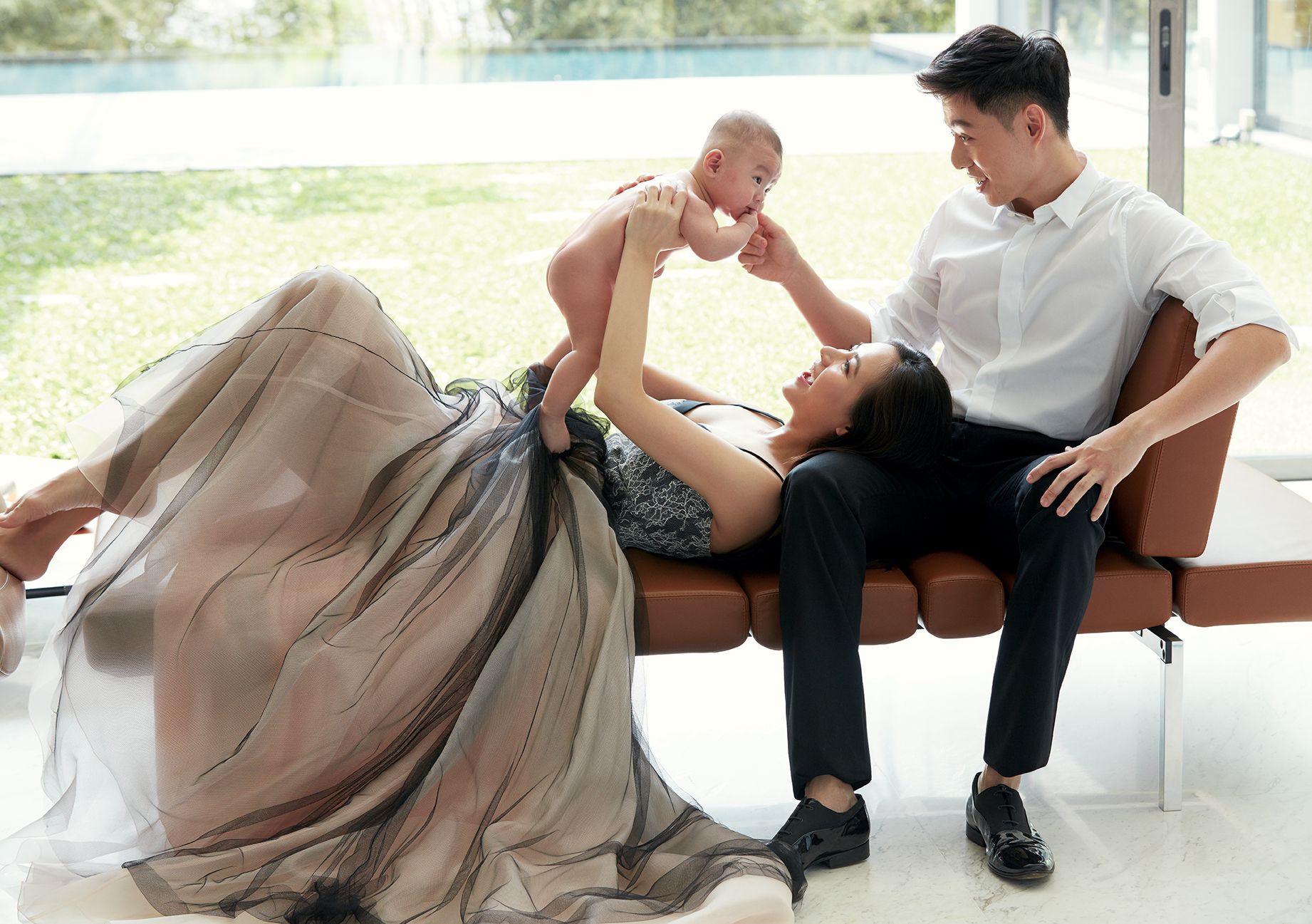 On Cheryl: tulle and lace gown by Lanvin; On Roy: his own suit and shoes