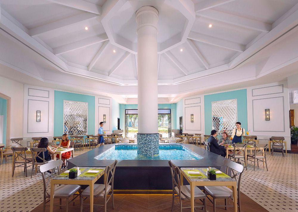 The restaurant's design flows seamlessly to the dining area, which looks more like a Peranakan home with a Hampton twist.