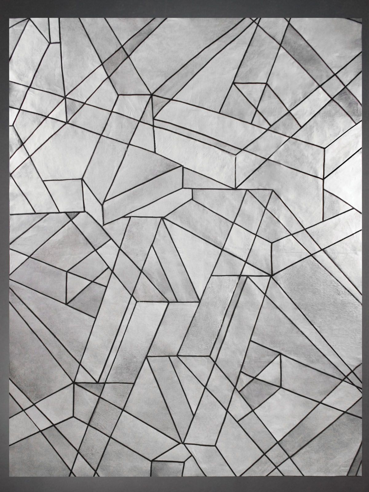 This shearling rug features a grid-like design