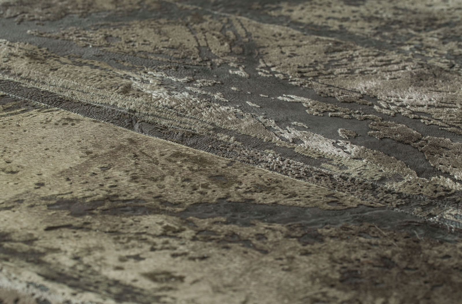 This rug from the Acid Splat collection features an industrial-inspired abstract motif