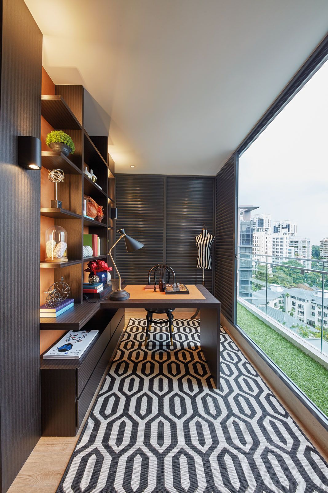 One of the balconies at the master bedroom is converted into a study that lets in the natural light
