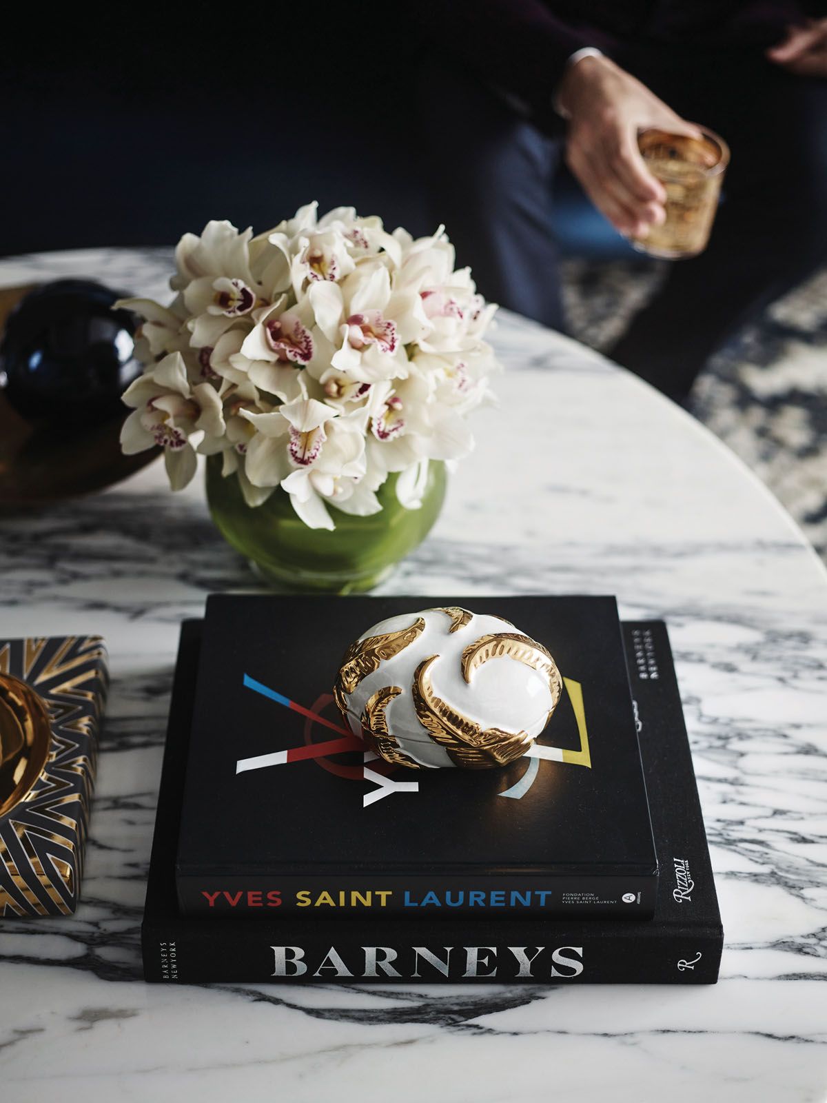 A close-up of the carrara marble coffee table at the living area