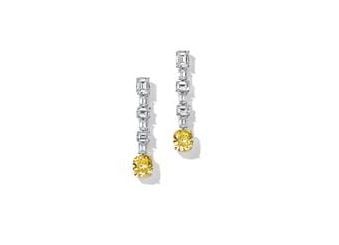 Earrings in platinum and 18k yellow gold with Fancy Vivid Yellow and white diamonds from the 2019 Extraordinary Tiffany Collection