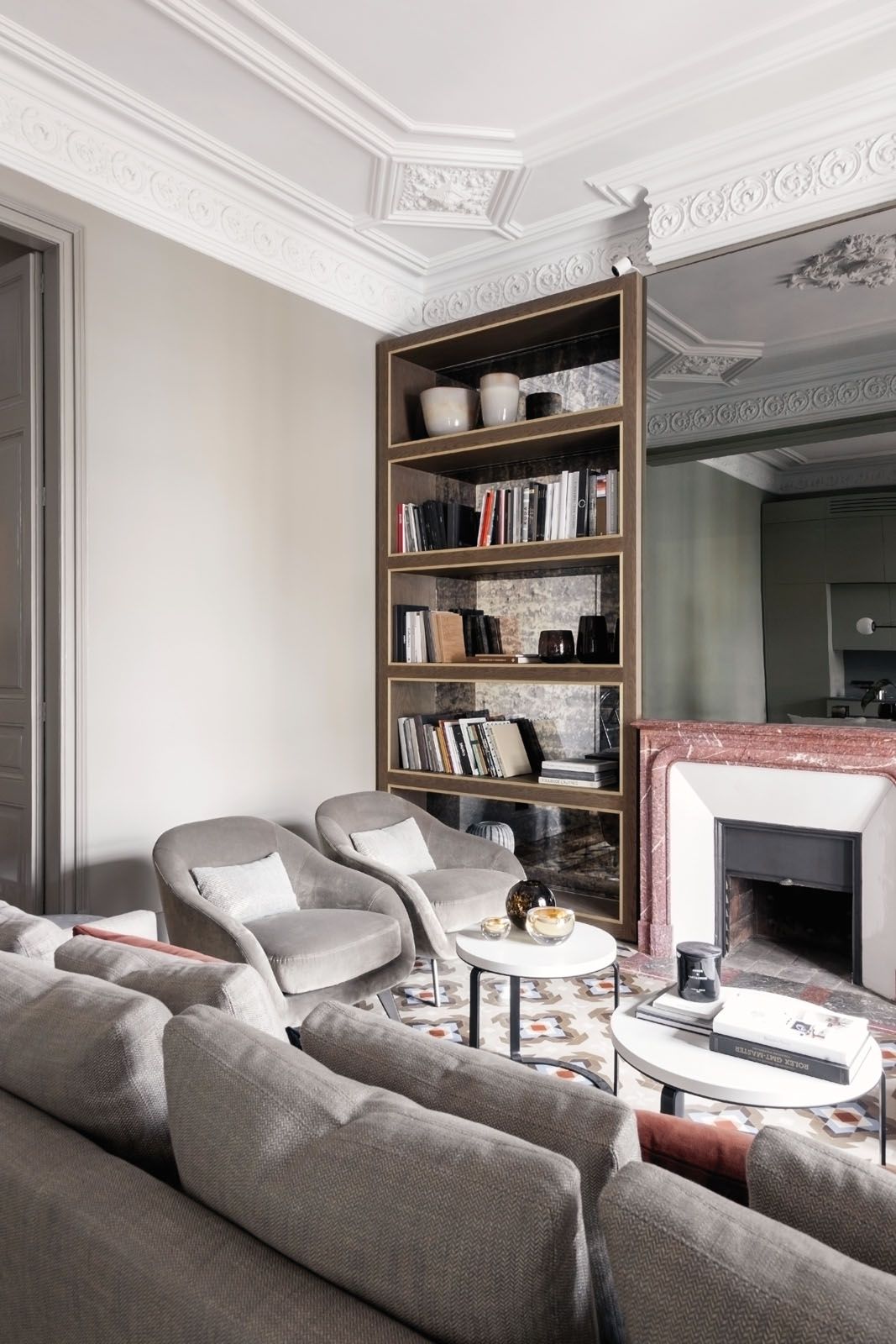 The marble fireplace is the centrepiece of the living area