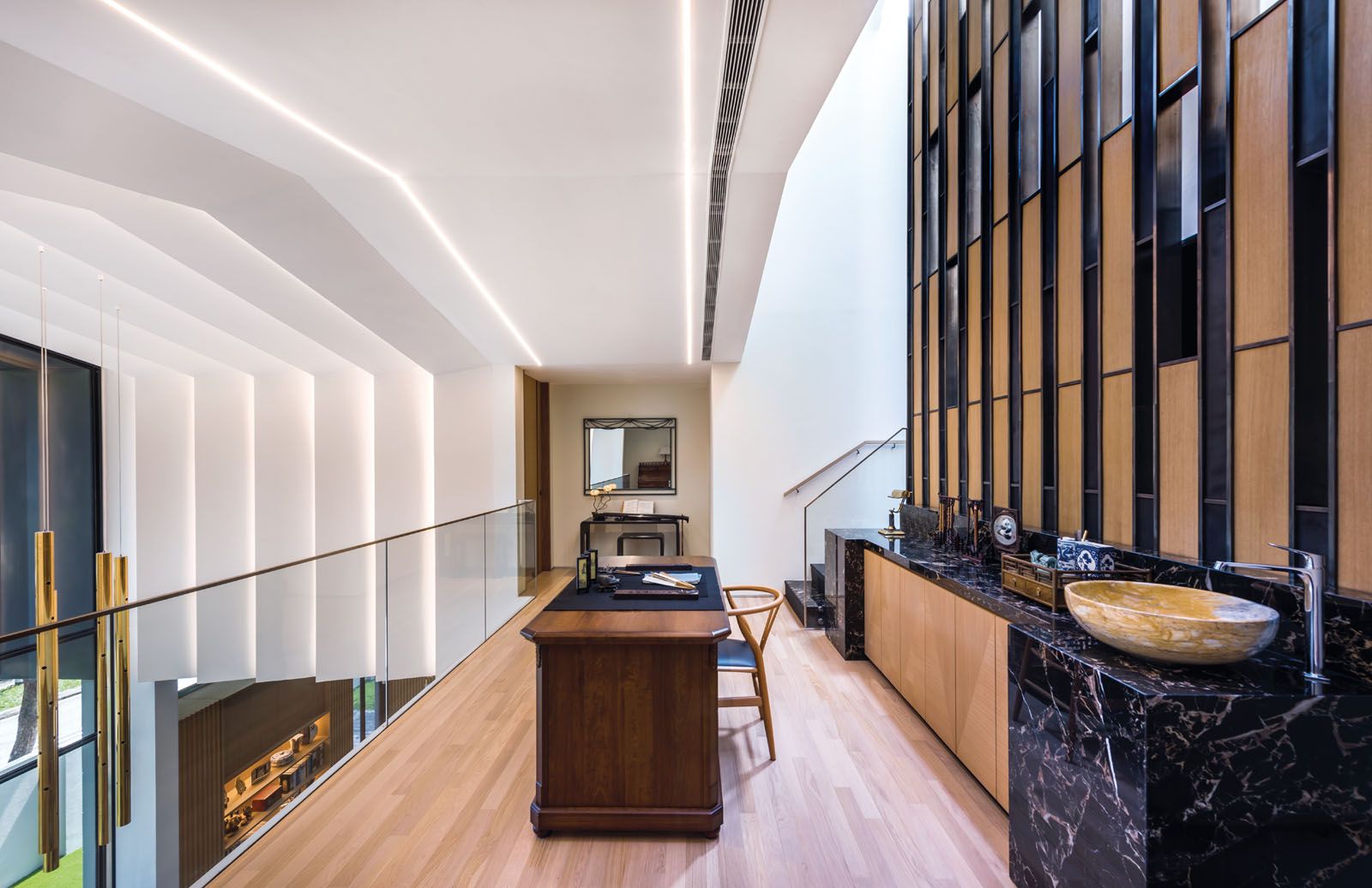 A study area on the second floor overlooks the dining area
