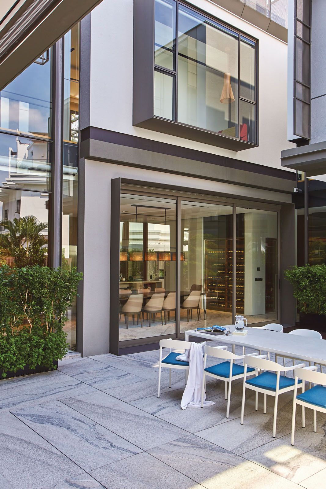 An outdoor dining set from Tribù maximises the use of the central courtyard, which is beside the kitchen and the lap pool