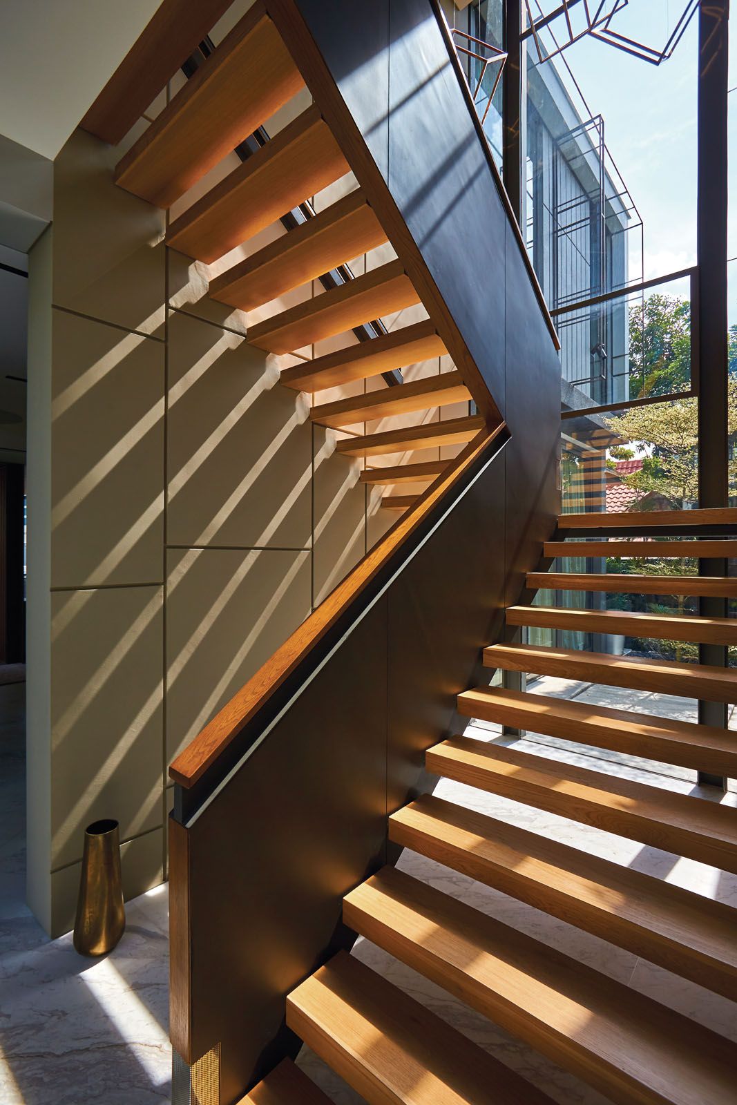 The cantilevered steps create enchanting shadow play on a sunny day