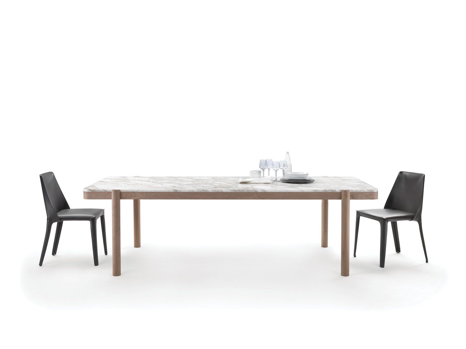 Gustav table and Isabel dining chairs by Carlo Colombo, from Flexform