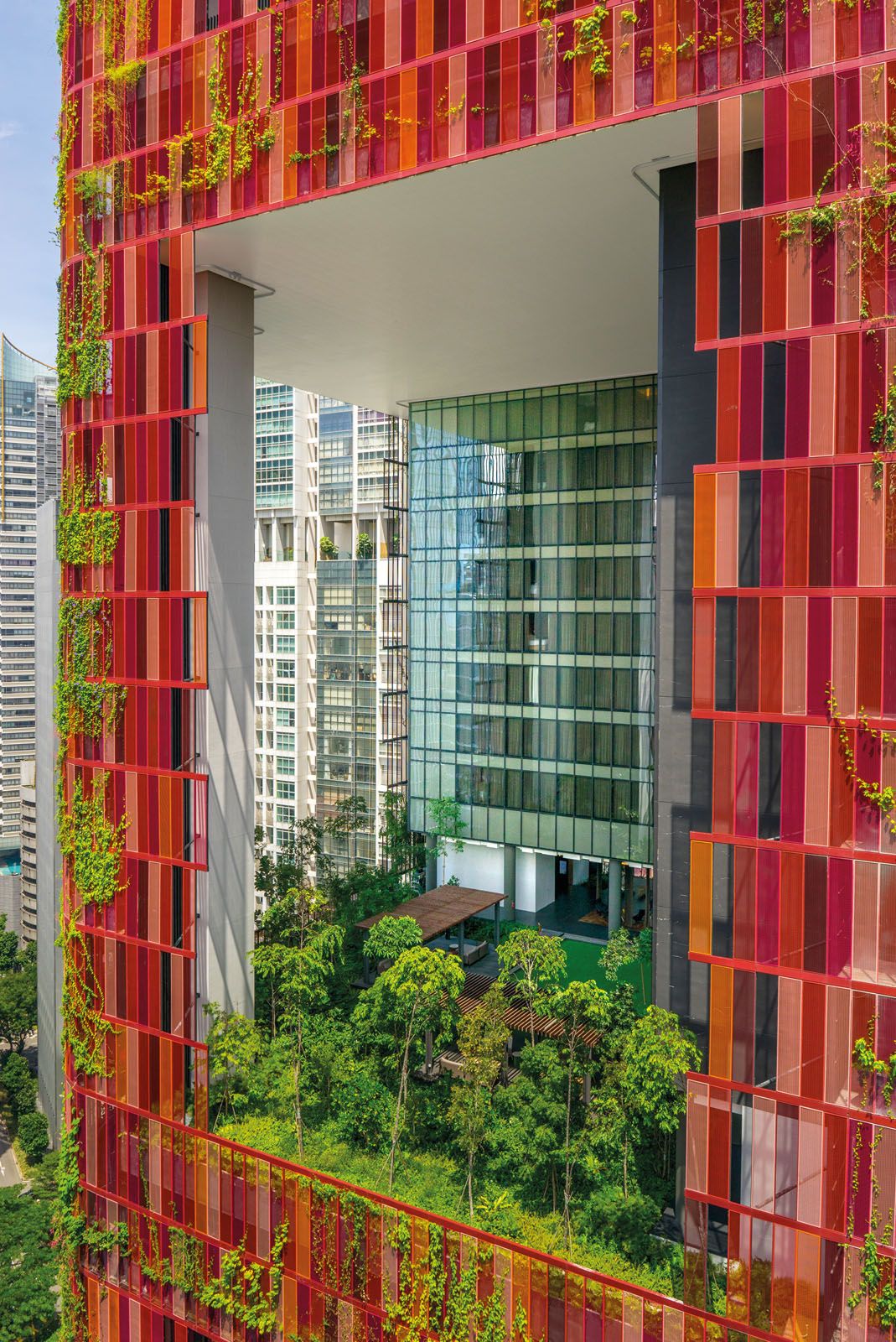 Sky gardens punctuate the facade of Oasia Hotel Downtown, Singapore. Such gardens, an oft-deployed Woha design feature, help absorb carbon emissions and also serve as communal spaces