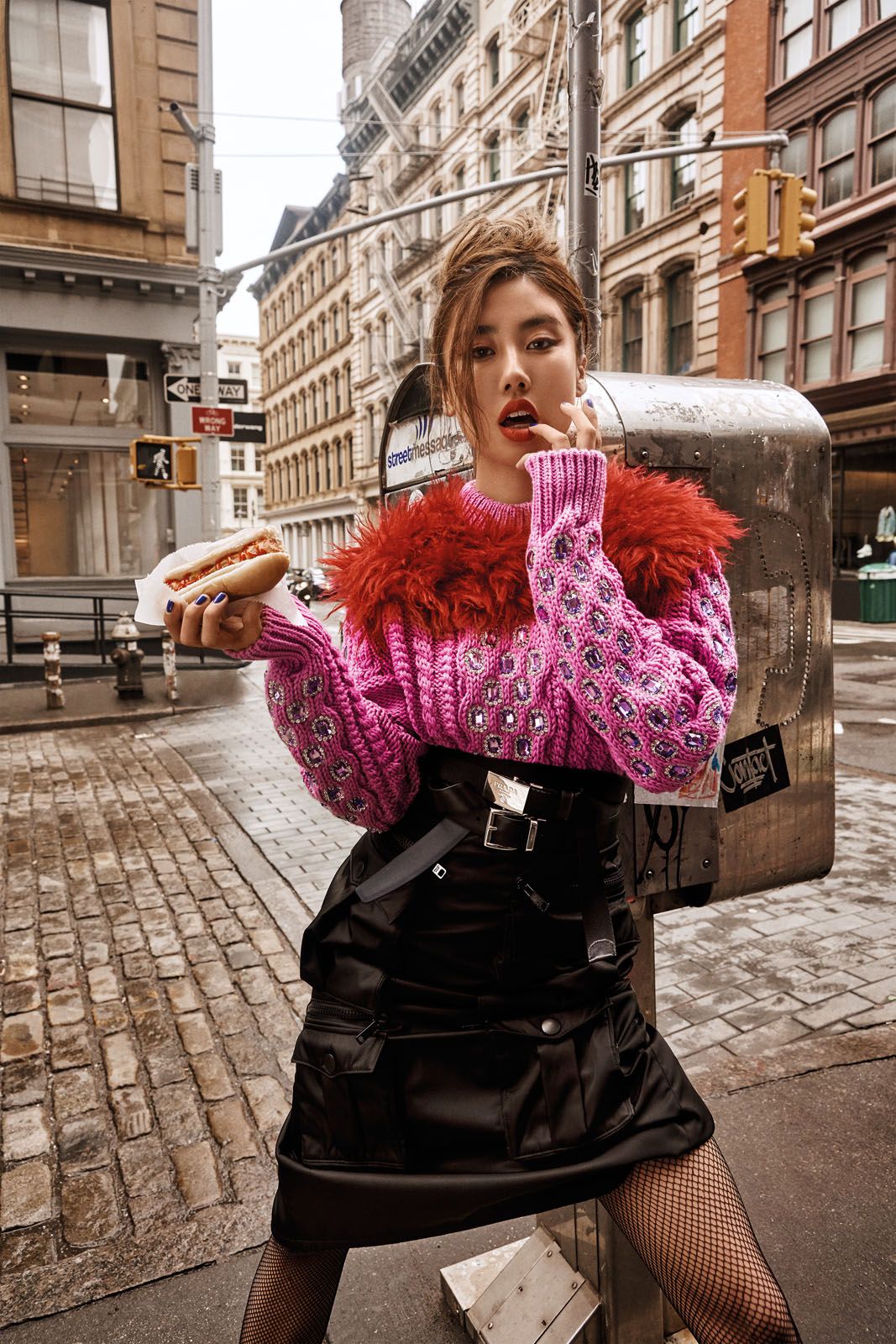 Embellished wool sweater, nylon utility skirt, leather belt and woven fabric belt, all by Prada