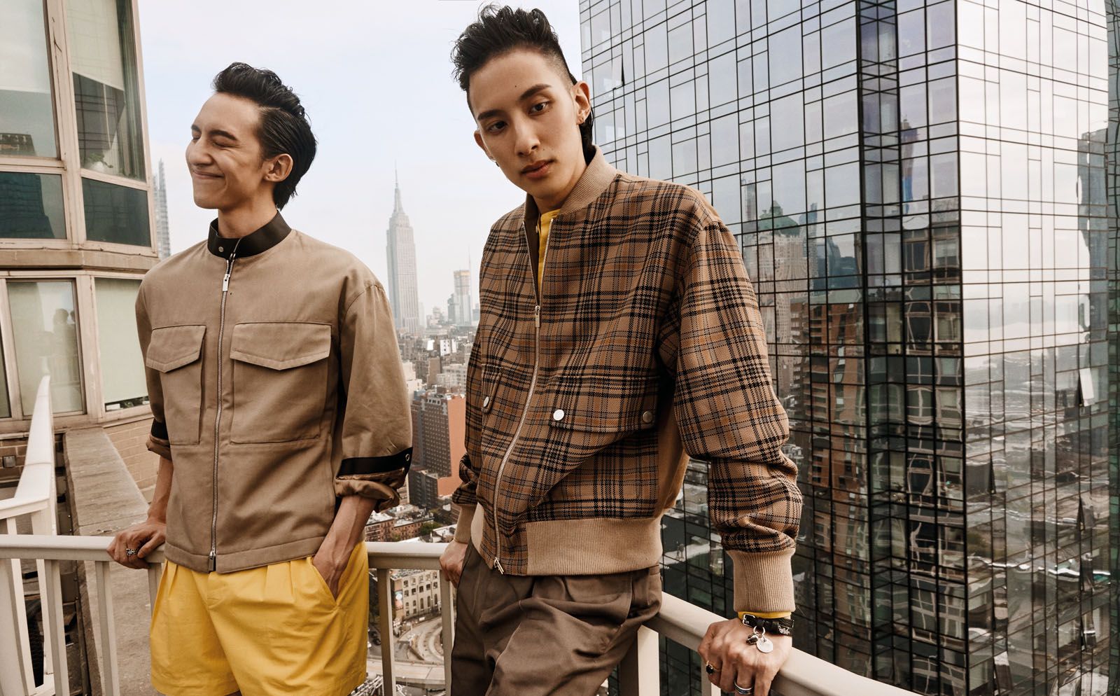 Brandon (left) wears cotton drill blouson with leather detail and compact cotton serge shorts, both by Hermès. Julien wears cotton blouson, cotton poplin shirt and compact cotton serge jogging trousers, all by Hermès