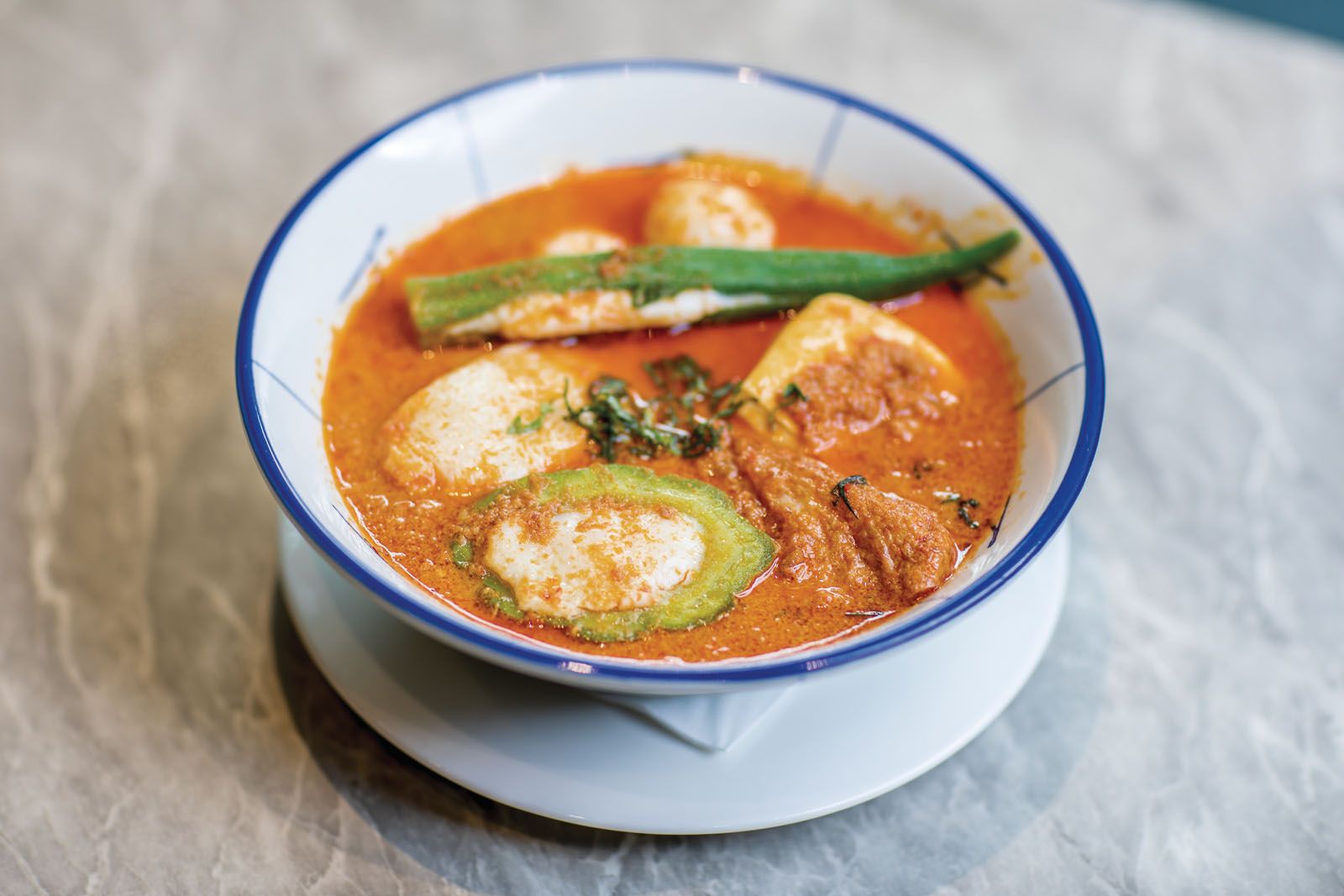 Peranakan yong tau fu (similar ingredients cooked in a laksa soup base