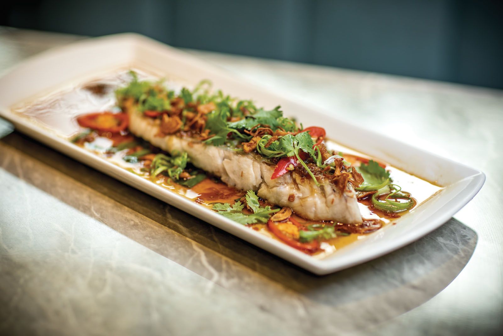 Steamed ikan kurau belly