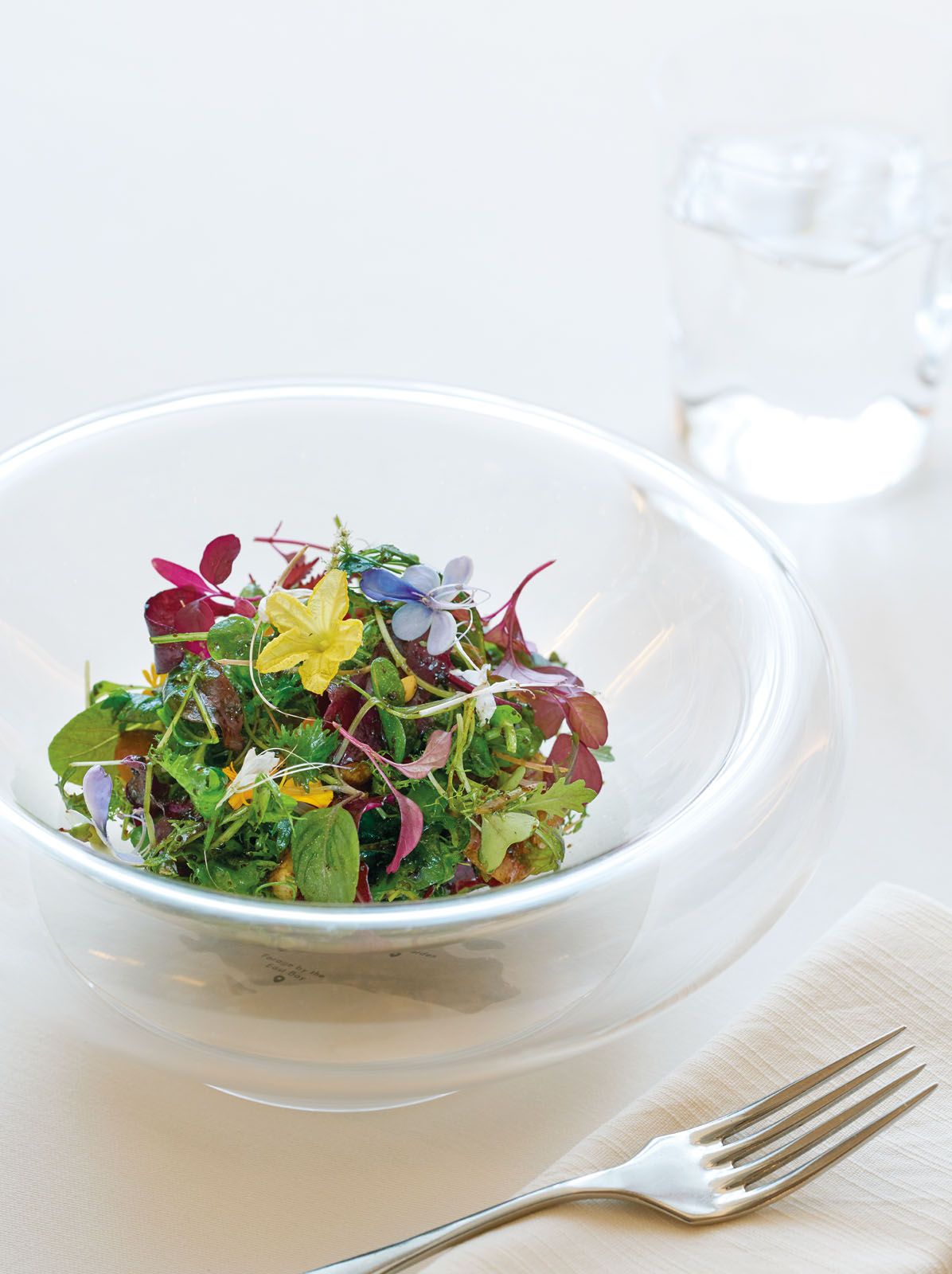 Promenade a Singapour by Julien Royer, Odette. A nod to local farms and flavours, this new salad to grace the menu boasts a wild combination of locally grown herbs and vegetables tossed with a dressing inspired by a popular local salad—rojak
