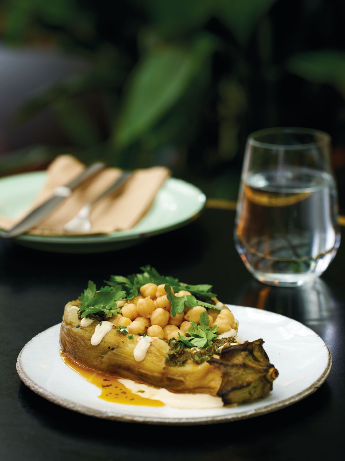 Charred eggplant by Shannon Binnie, The Botanic. This popular gluten-free dish from the restaurant’s selectiion of vegan dishes features organic Australian eggplant served with tahini, chickpeas, chermoula and soft herbs.