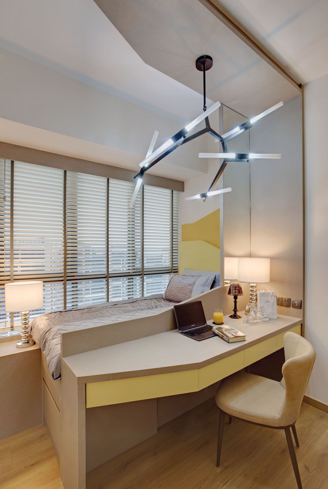 The saber-inspired pendant light is the focal point of the son’s bedroom