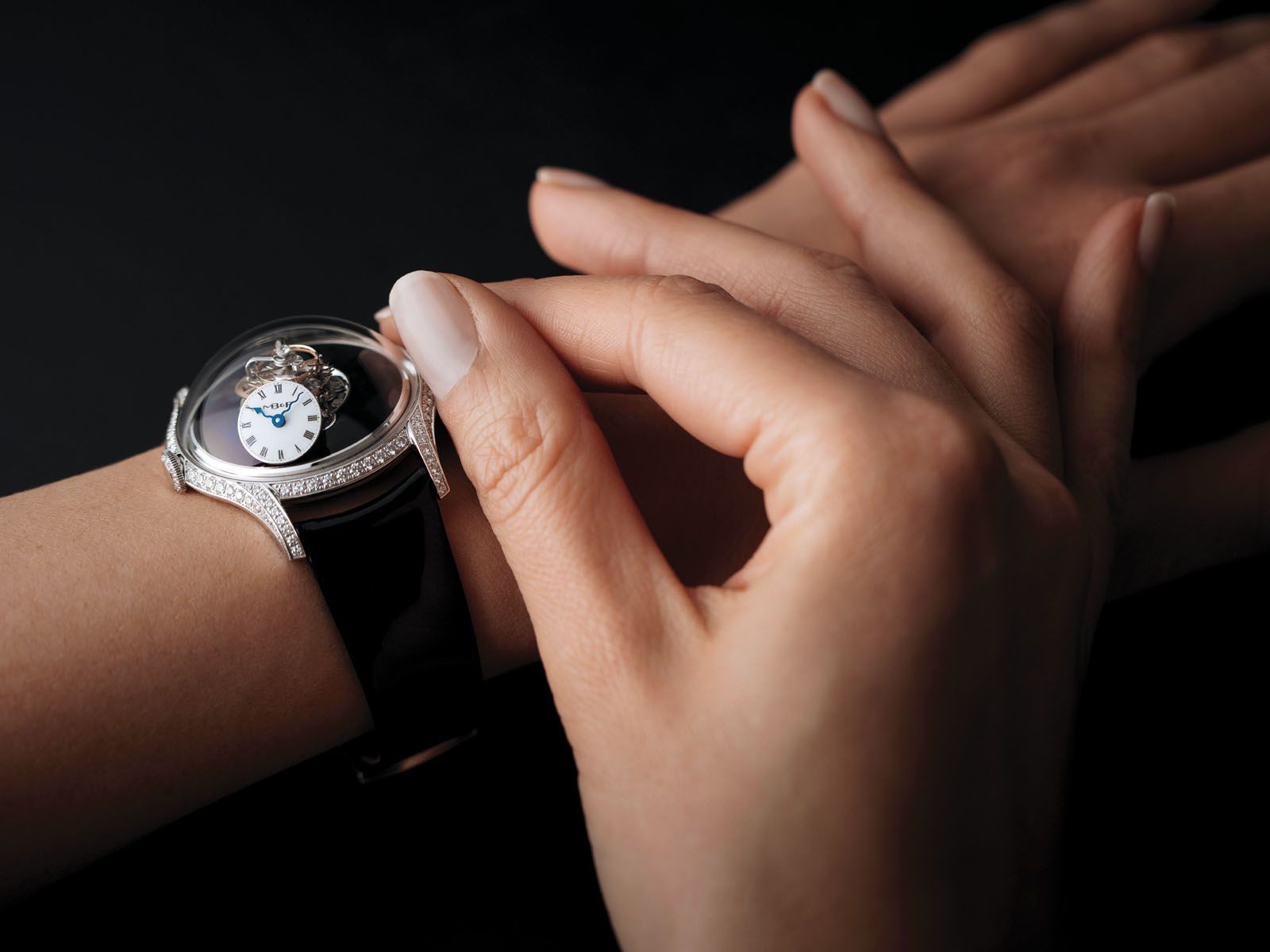 The MB&F LM FlyingT comes with an elegant black lacquered dial and a diamond-set case; MB&F founder Maximilian Büsser admitted that he had no idea how his female creation would be received