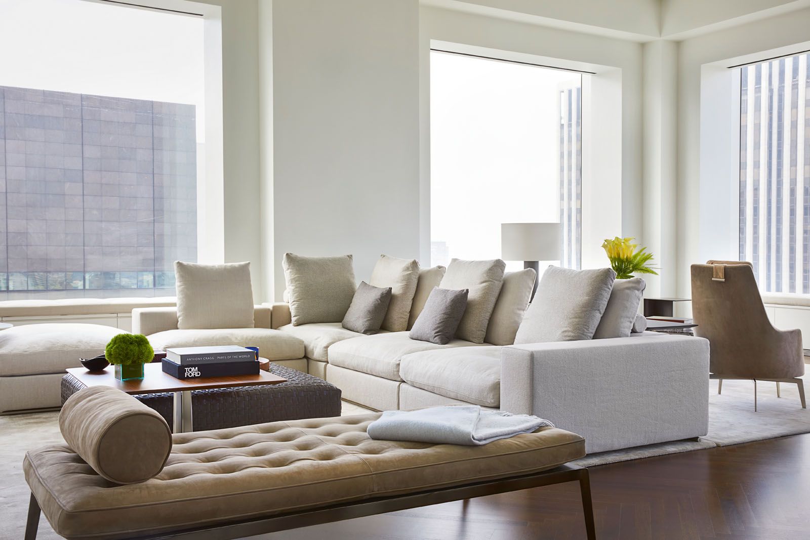 The living area features the Flexform Groundpiece sofa and Magi daybed
