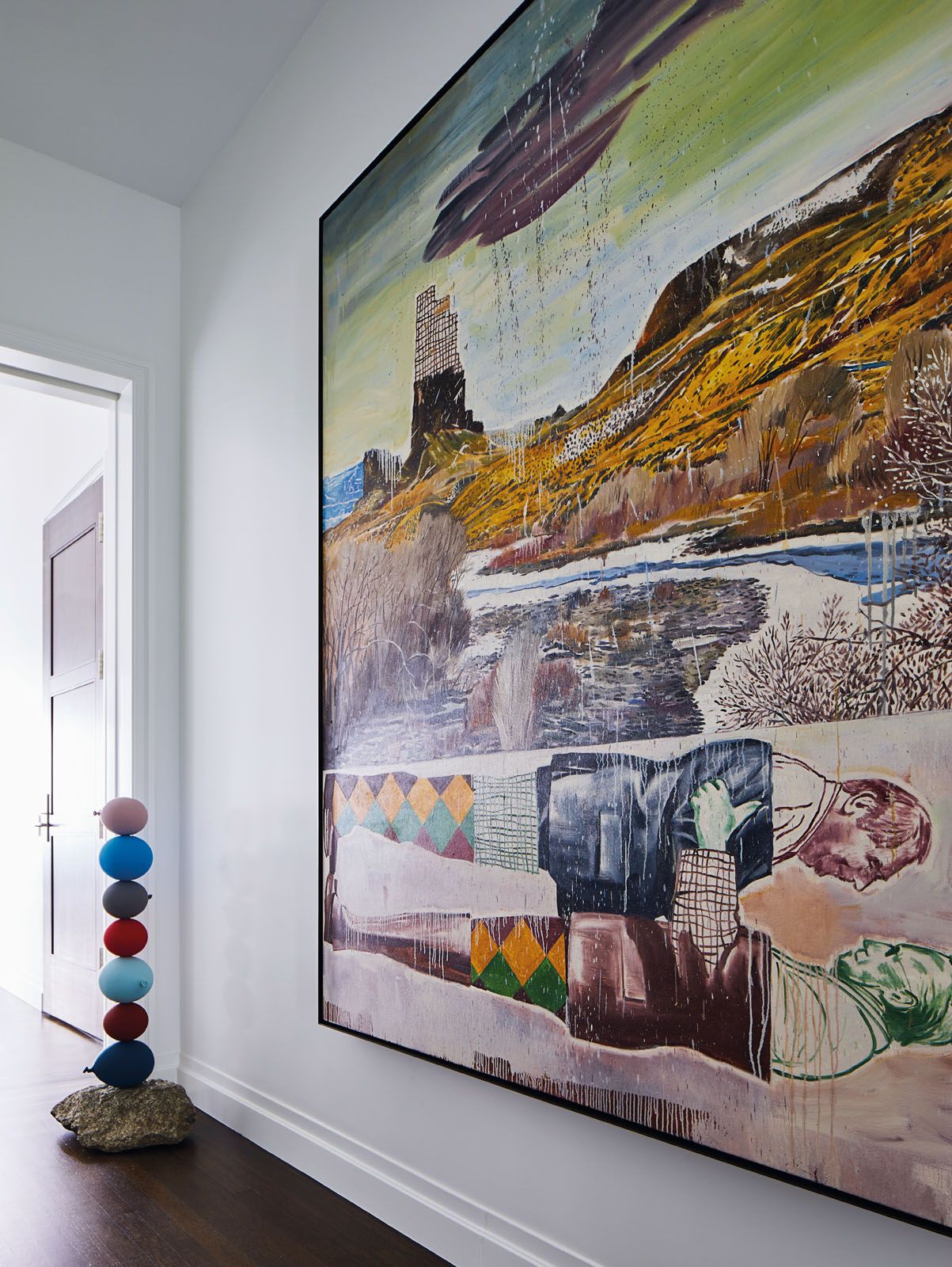 A sculpture by Gimhongsok is placed next to a Nicky Nodjoumi painting