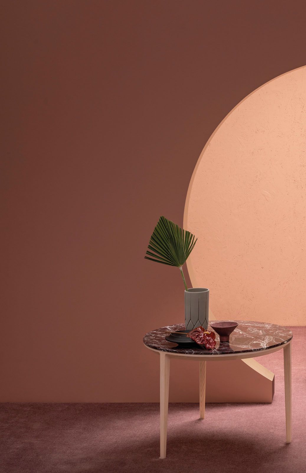 Designed by Metrica, the Etoile side table features a distinctive three-legged structure