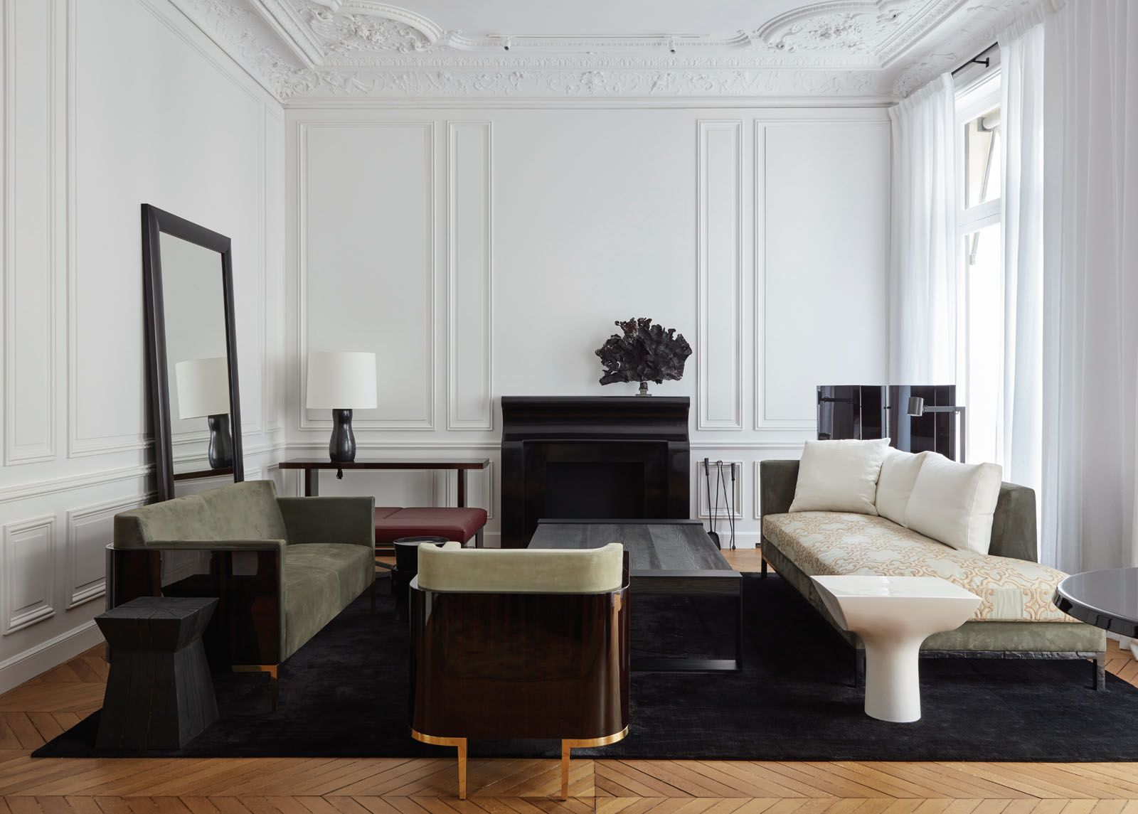 The French brand is known for its signature mix of bronze trimmings, dark wood and elegant design