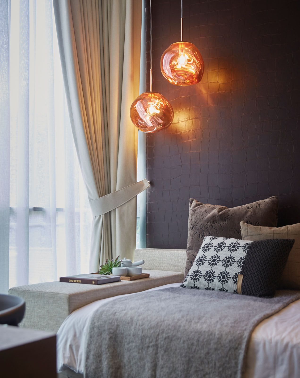 The Melt pendant lights from Tom Dixon add visual interest to the son’s bedroom