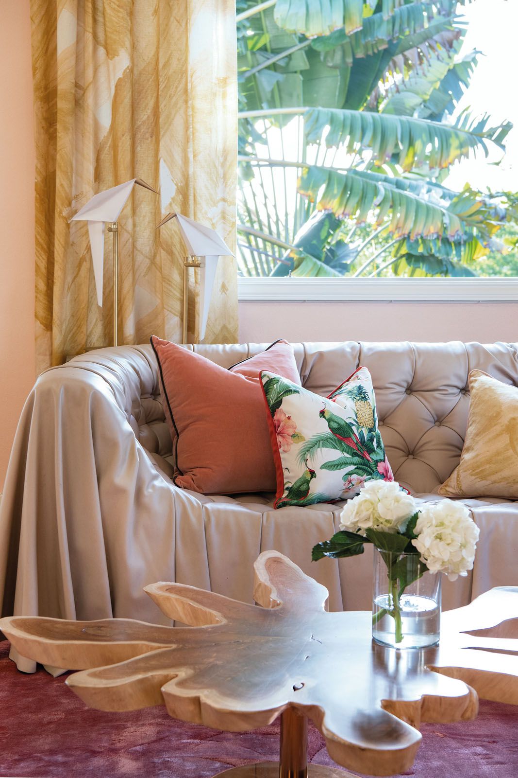Playful elements, such as the Moooi Perch floor lamps, add a dash of whimsy to the room