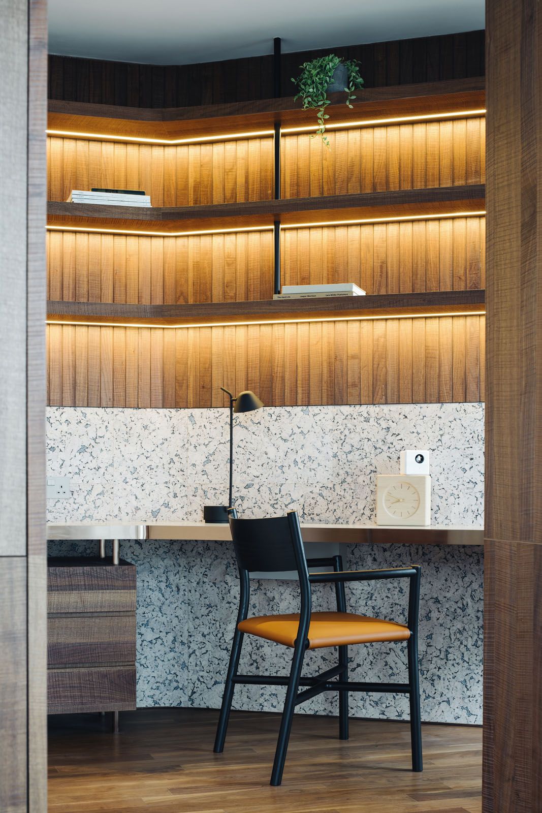 The light cork wall panelling from Portugal adds texture to the study