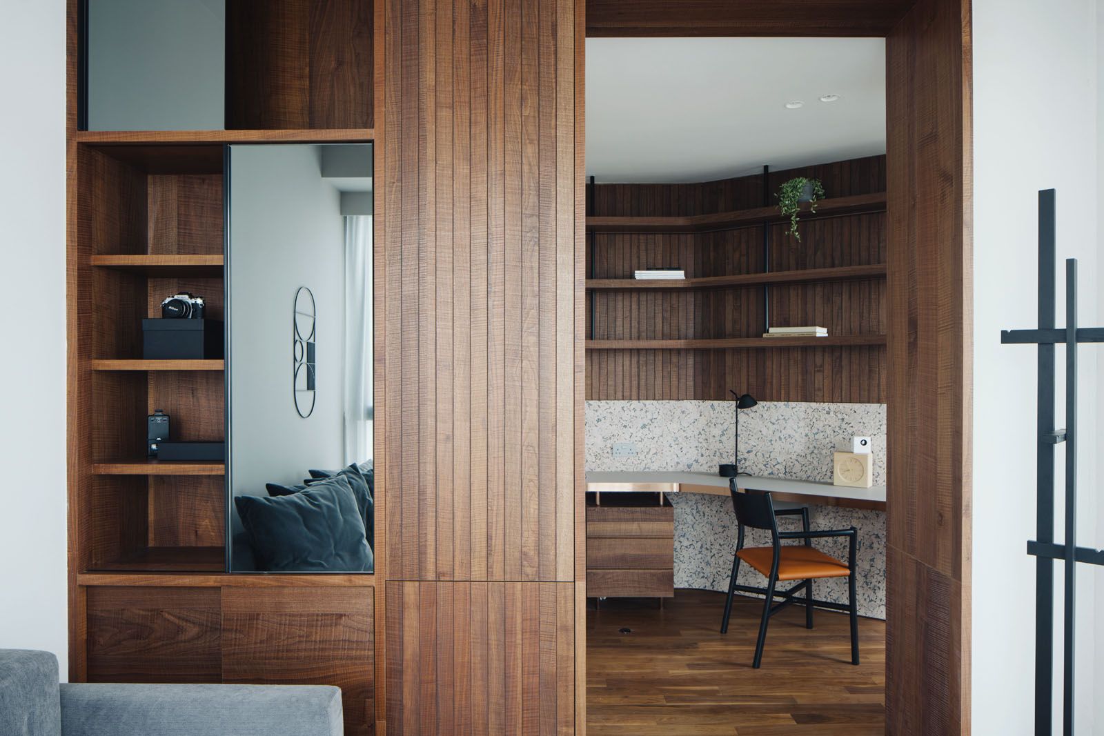 The study features joinery in a tactile finish that contributes to the craft-led aesthetic