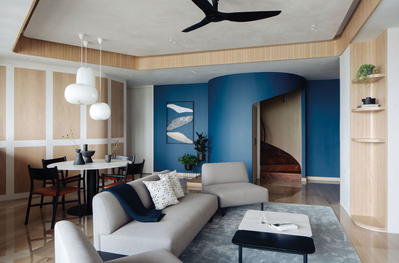 The ceiling and walls are dressed in Mamorino plaster, creating a fitting backdrop to Gabriel Tan’s sculptural furniture