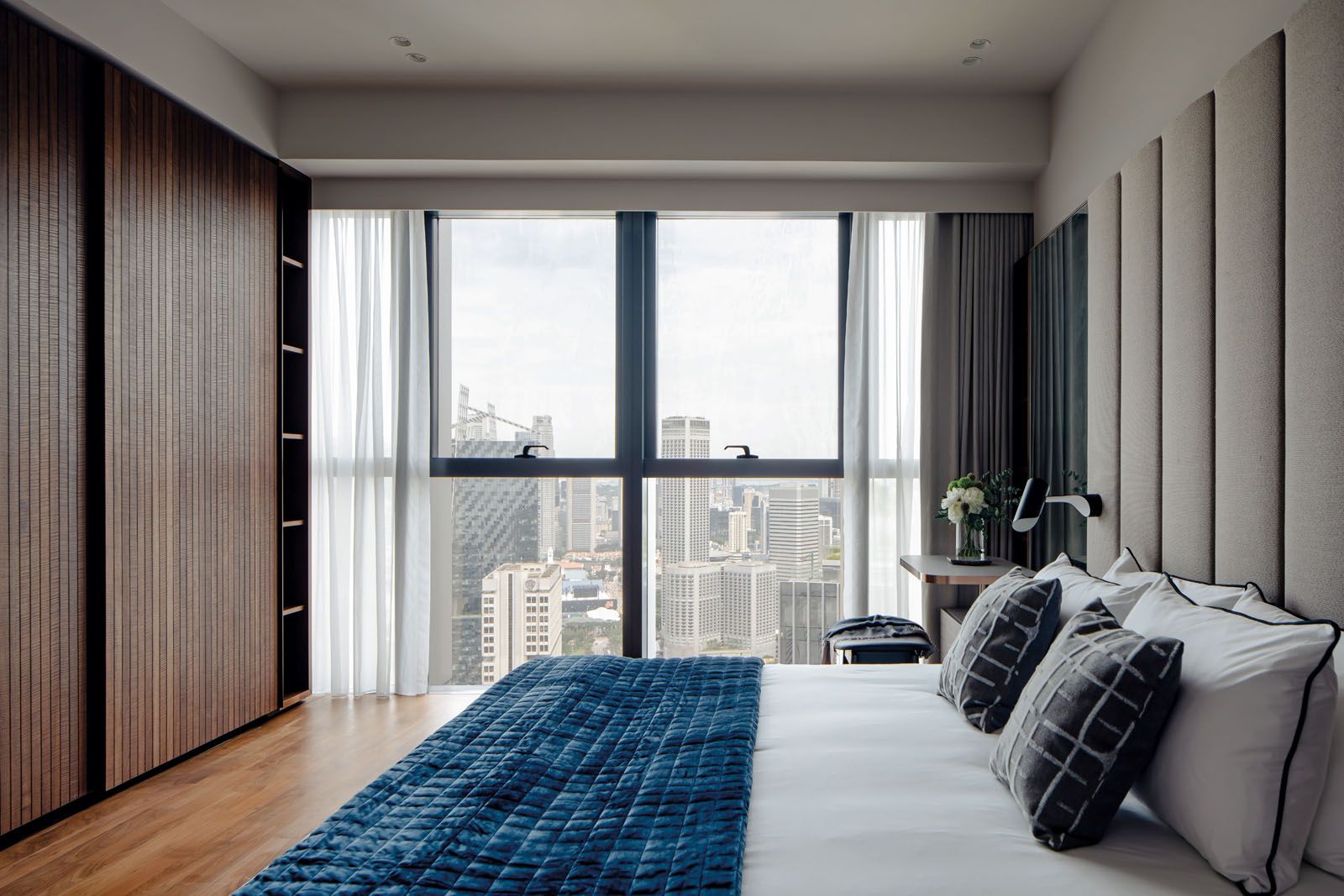 The vanity counters in both the master bedroom and secondary bedroom are custom-designed by Tan to bring a sense of elegance and occasion to daily grooming rituals