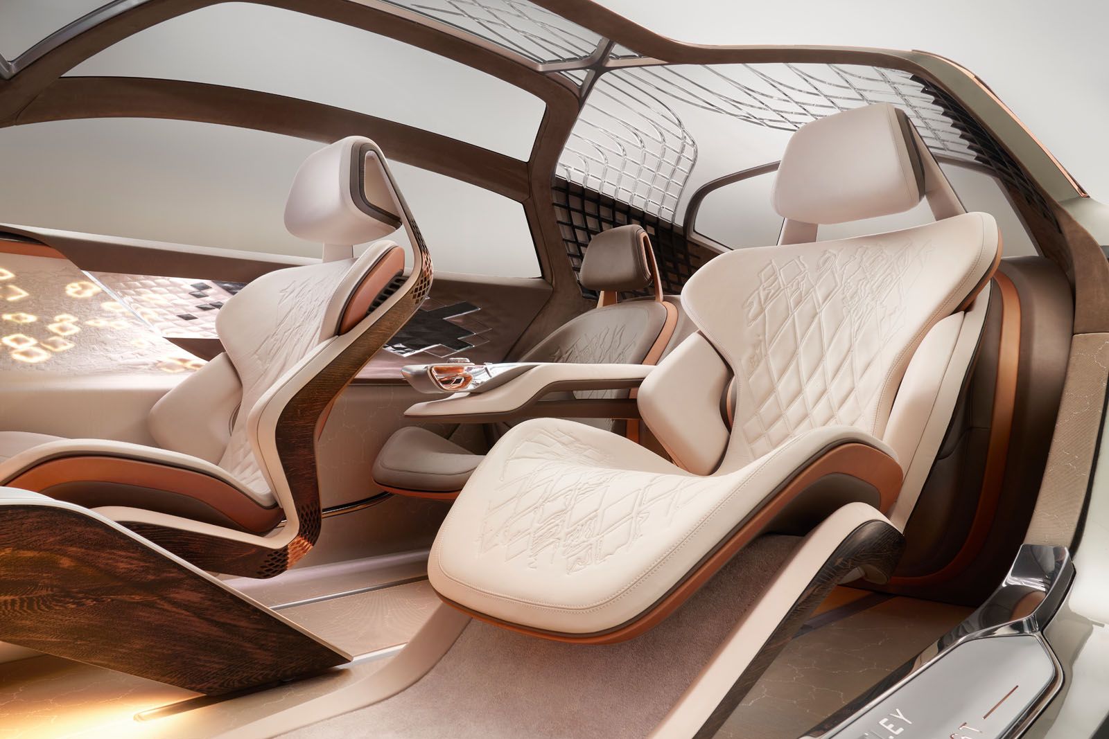 The concept car’s futuristic interior design makes use of sustainable materials such as 5,000-year‑old copper-infused riverwood and organic leather-like fabrics