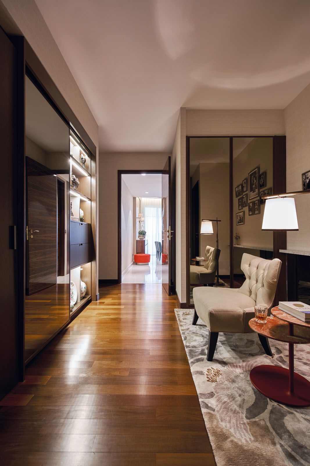 A lounge area in the corridor serves as another cosy spot in this home