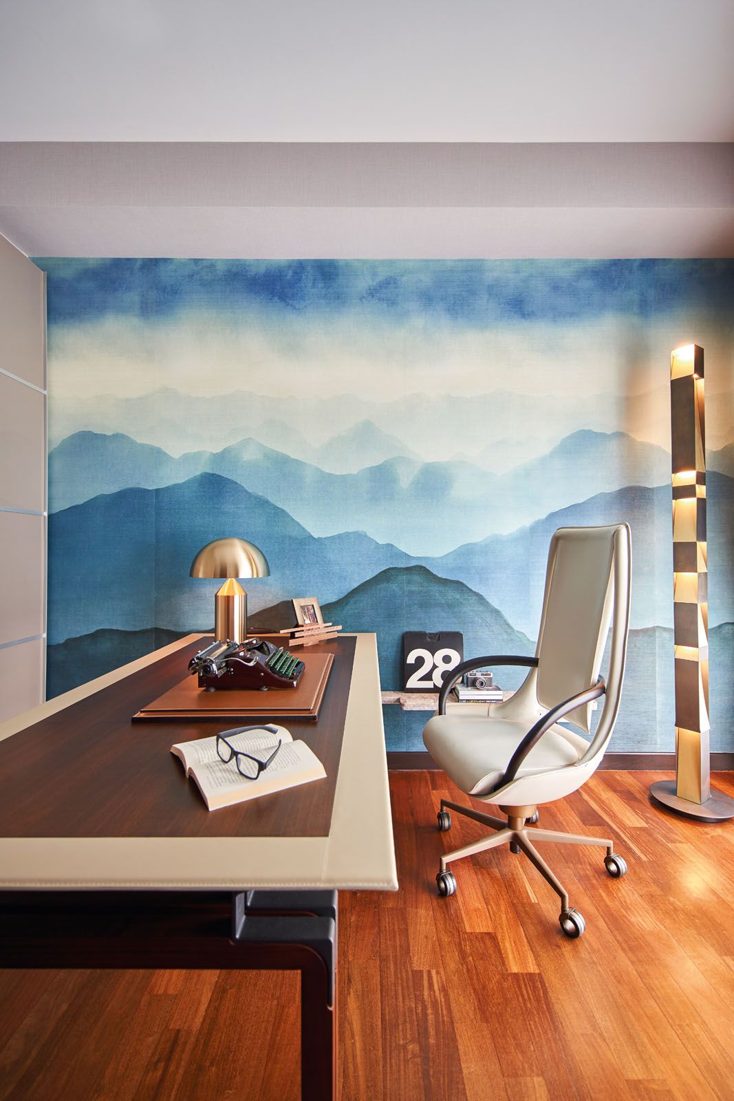 The Pierre Frey wallpaper adds to the tranquil mood of the study while adhering to fengshui requirements
