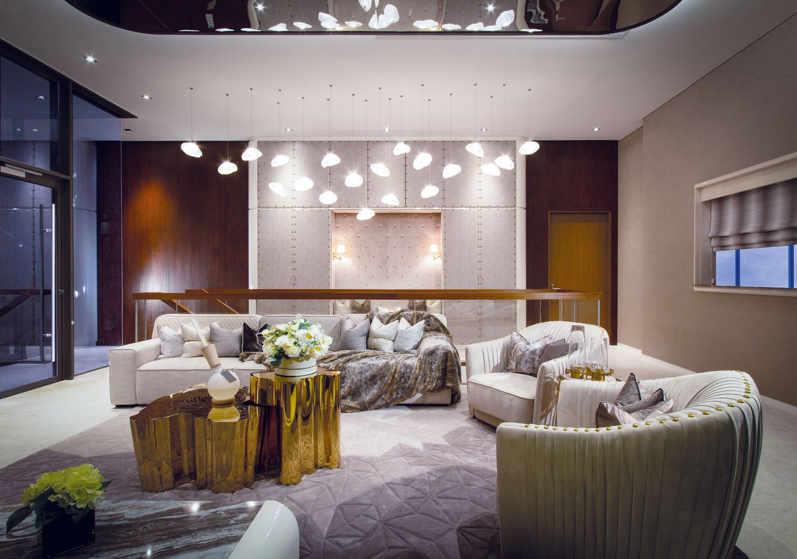 The living room incorporates a snug circle of seats and other cosy alcoves