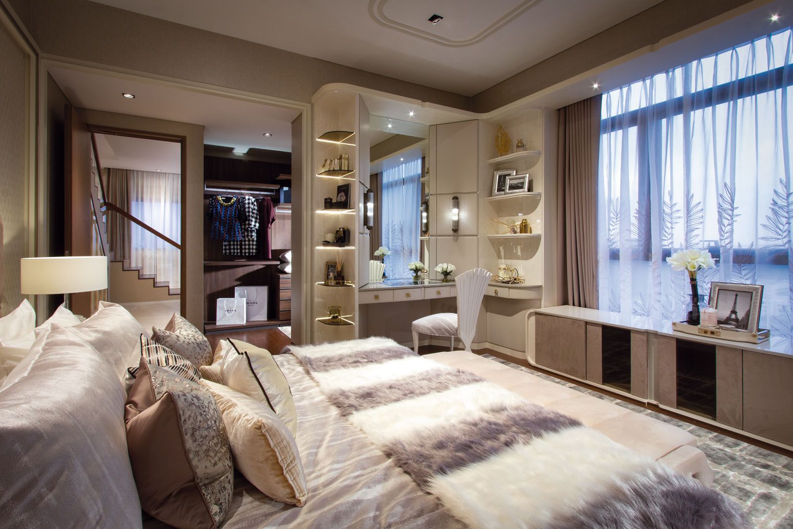 The master bedroom features classical detailing and a calming neutral palette