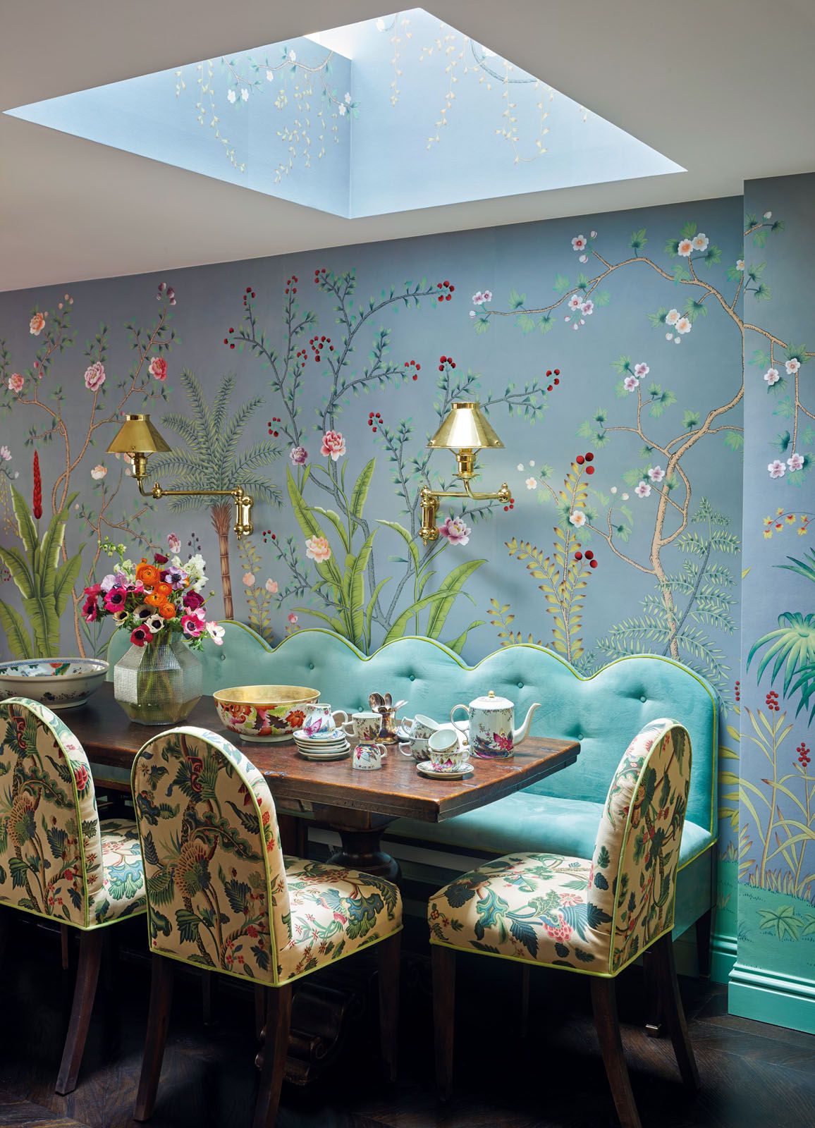 The living room is furnished with custom-made pieces and antiques such as a sofa from the 18th century