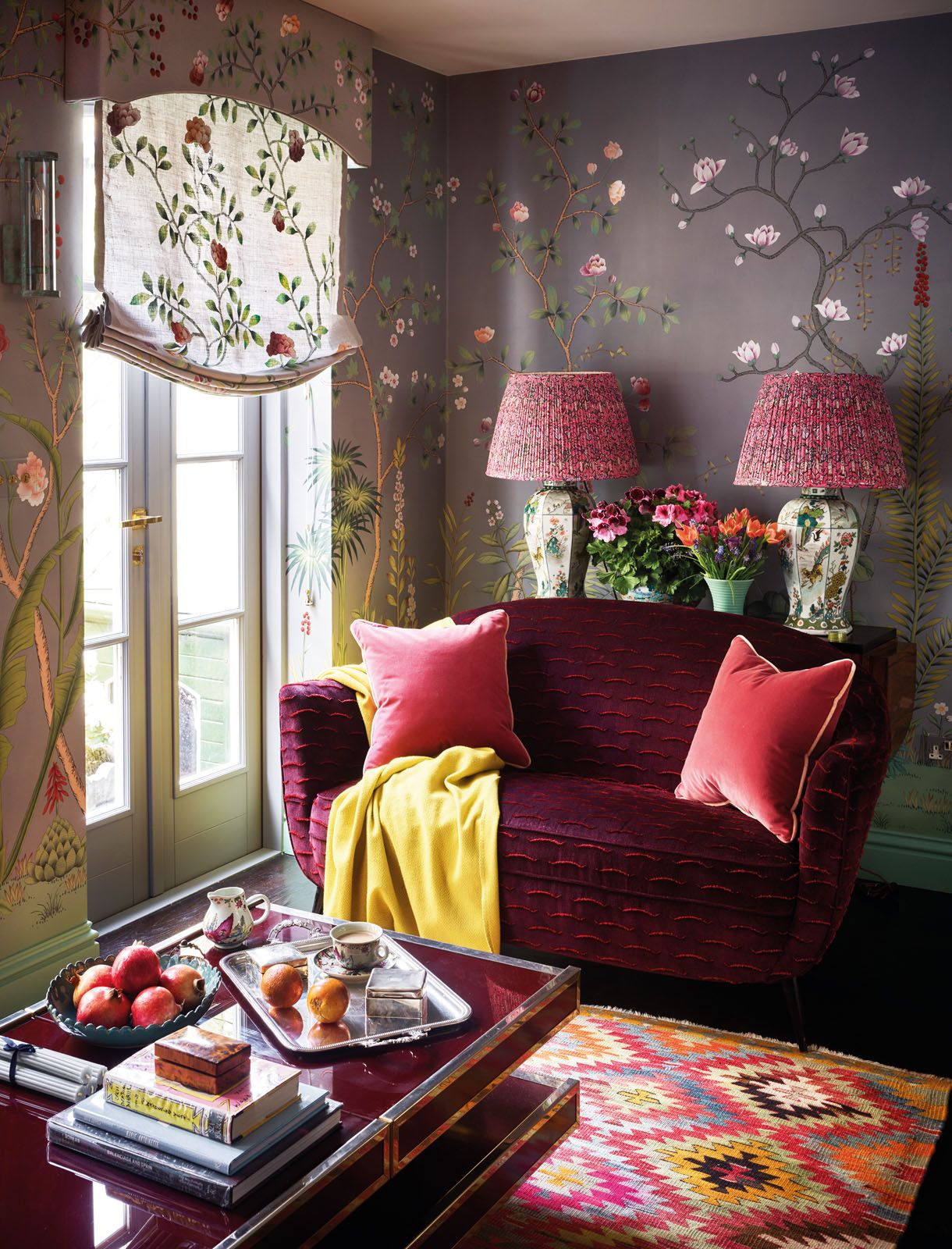 The chinoiserie influence is also evident in the choice of furnishings selected to match the wallpaper