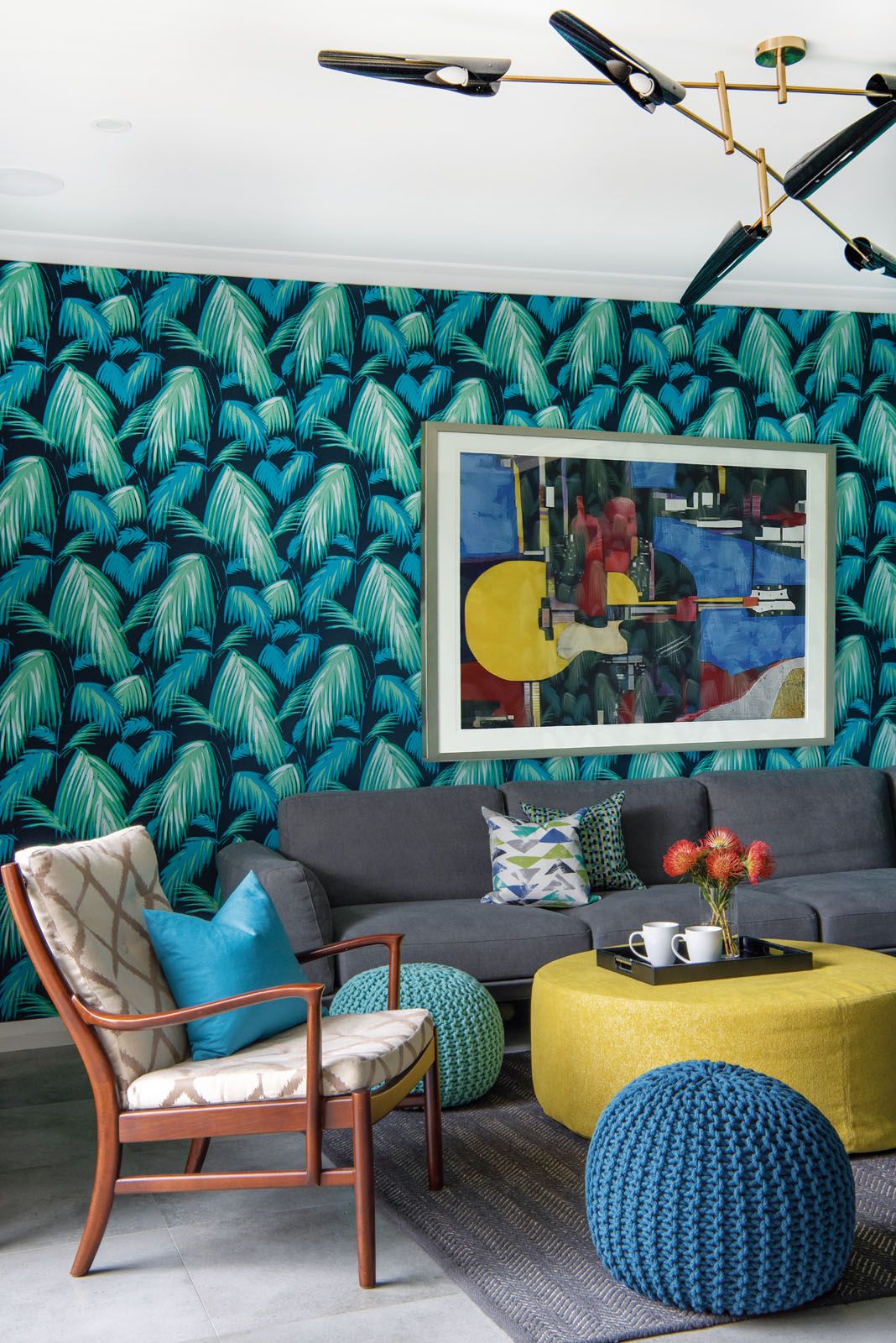 The family room features an original mid-century chair and the Coltrane ceiling light from Delightfull