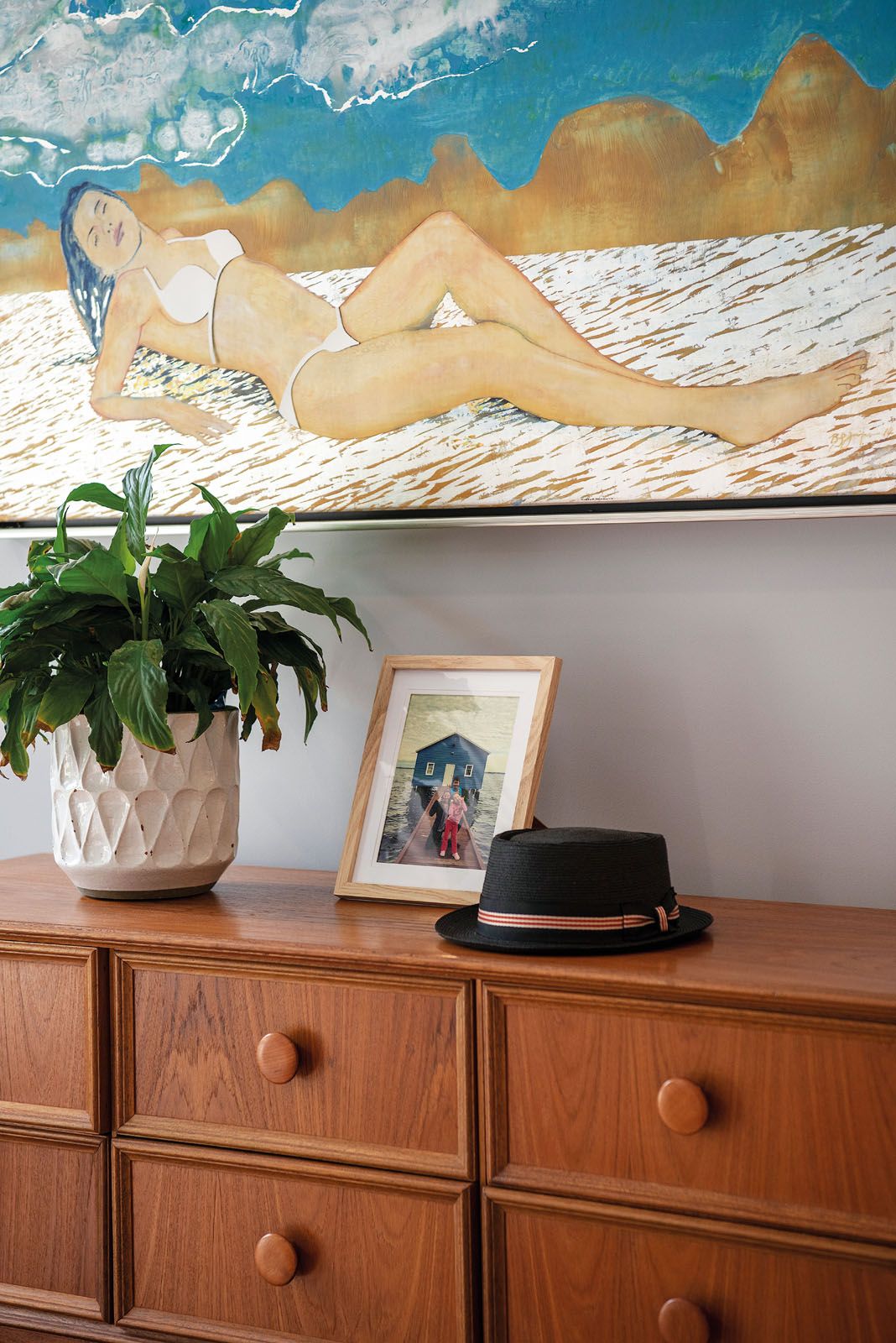 This tranquil artwork adds to the cosy atmosphere in the master bedroom