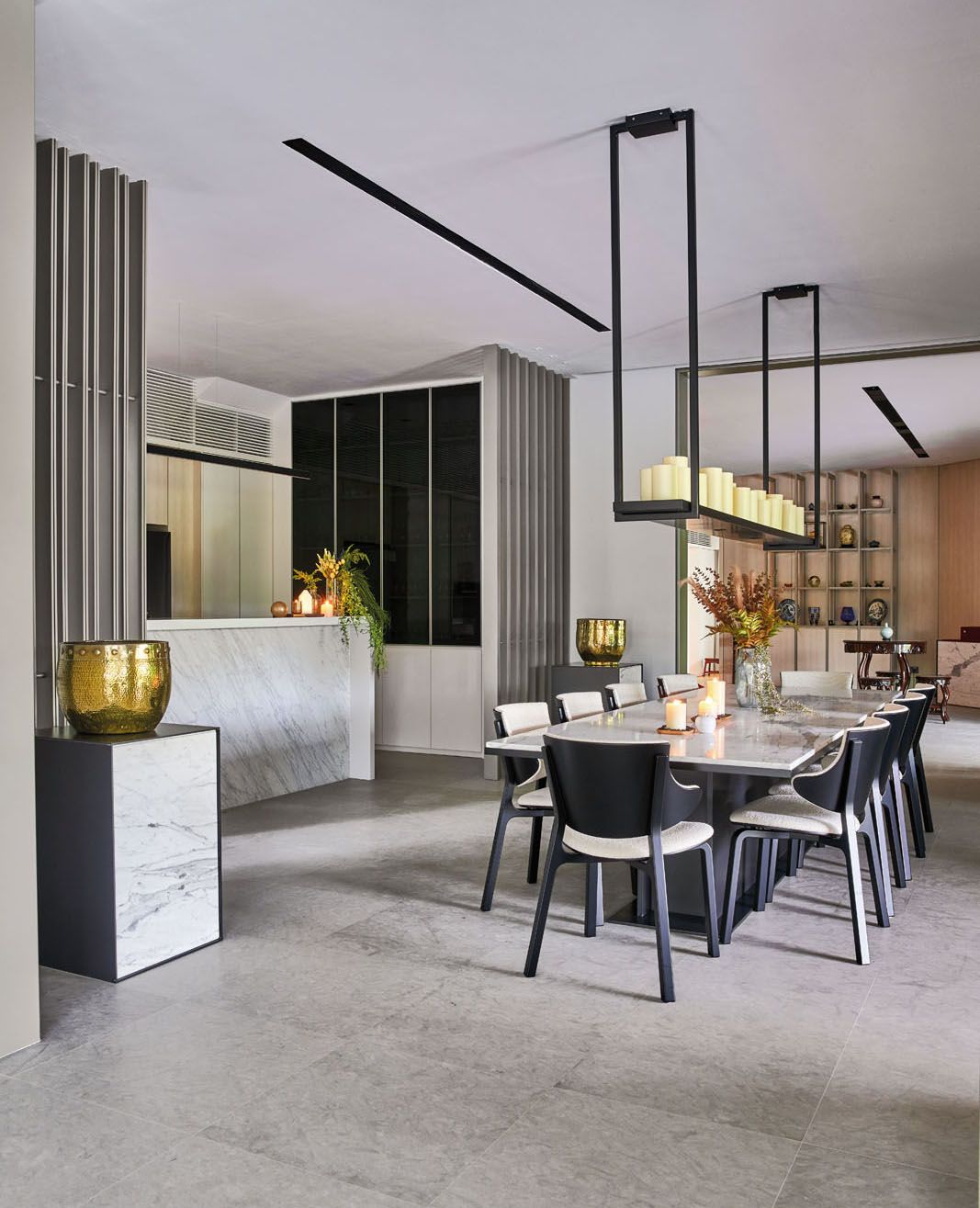The dining area features a custom-made table with Tendo Mokko chairs