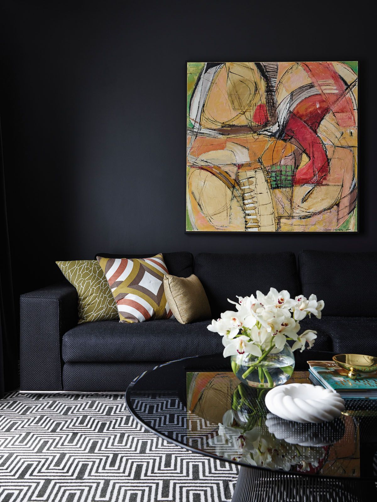 Sombre hues dominate the lounge