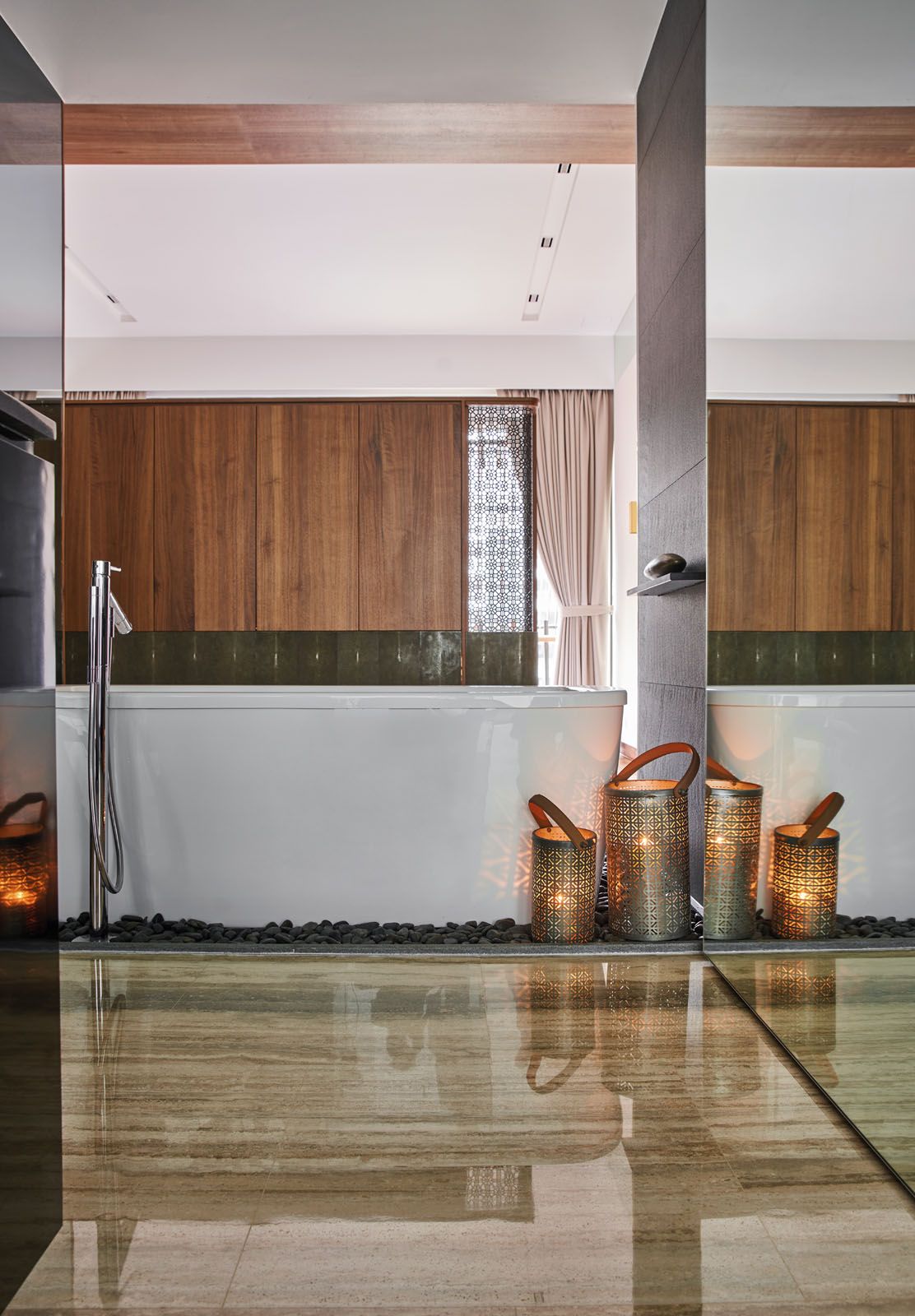Pebbles were added to the base of the freestanding bathtub in the master suite to create a spa-like ambience